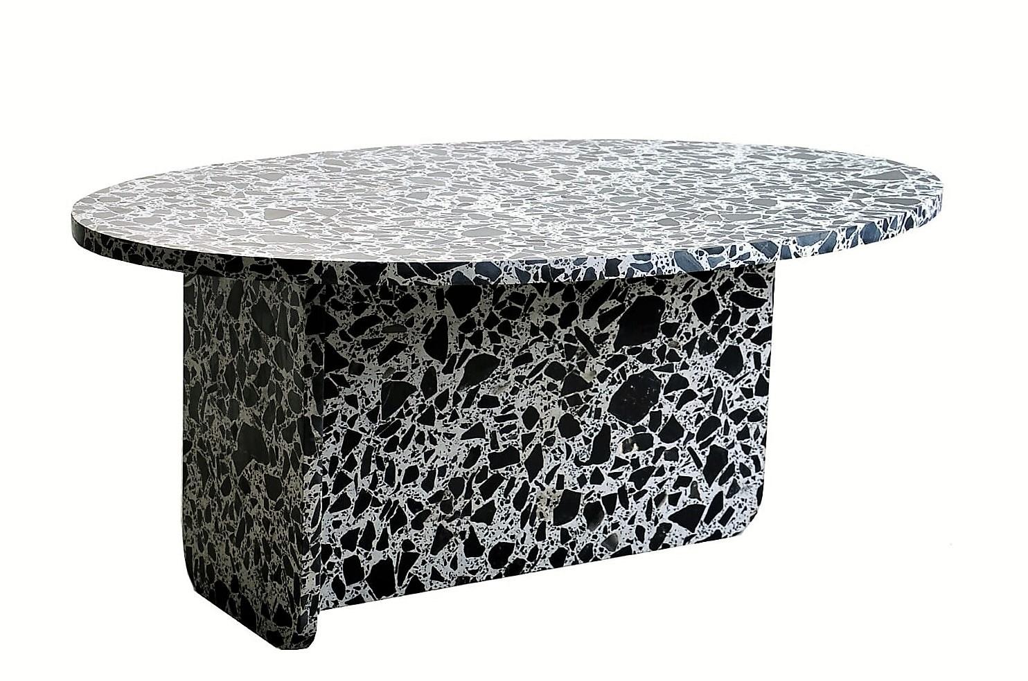 The natural terrazzo nesting tables are perfect for smaller outdoor spaces where an extra table can come in handy. Use one as a side table, or as a coffee table in the living room. The tables are crafted entirely of polished Italian terrazzo with