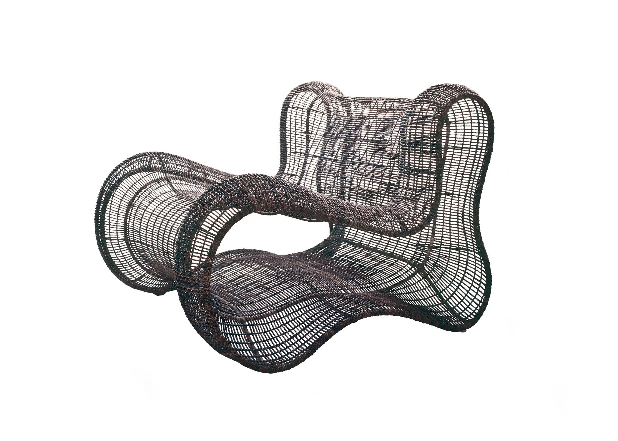 Indoor Pigalle easy armchair by Kenneth Cobonpue.
Materials: Abaca, Nylon, Steel. 
Also available in other colors and for outdoors. Prices for upholstery and fabric upon request.
Dimensions: 100 cm x 97 cm x H 77.5 cm 

Experience the