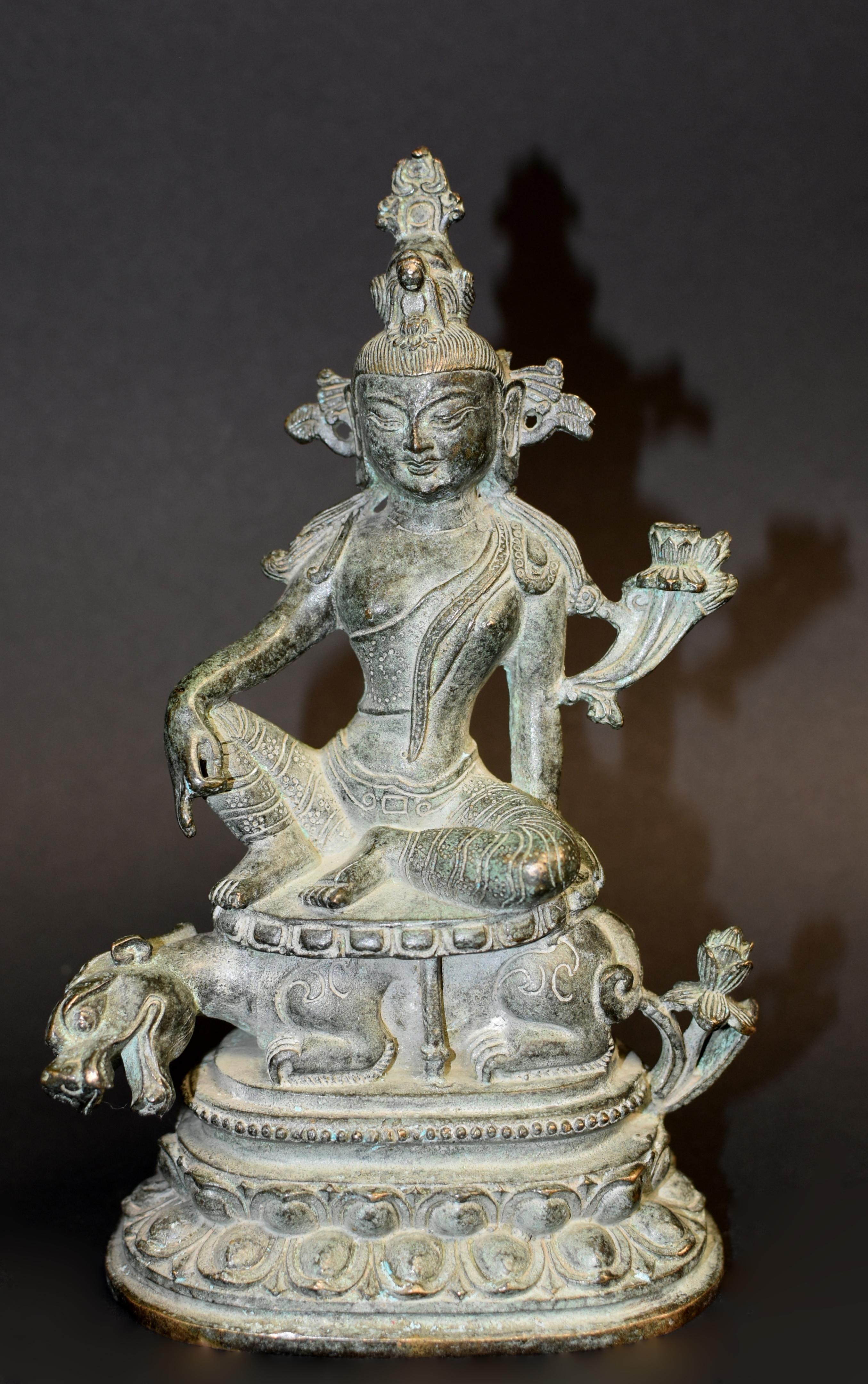 A very rare statue of the Tibetan/Hindu Buddha Indra. Indra is the King of Gods who possesses mighty power to destroy evil and deception. He is the most important and celebrated deity in Vedic Hinduism. Seated with the right knee up on top of a