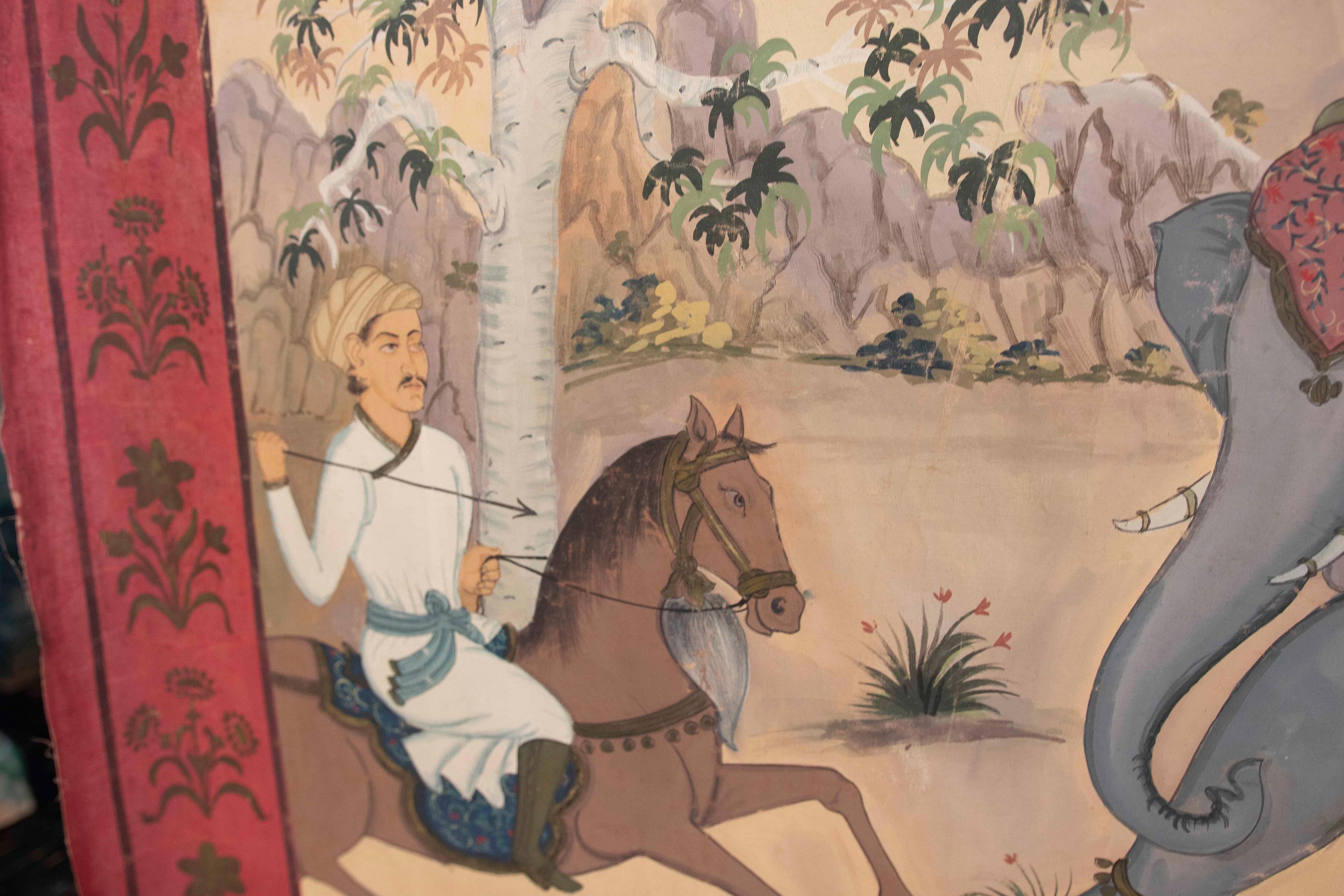 20ième siècle Peinture de chasse d'un tigre avec un éléphant et des ornements chantournés bordant la scène en vente