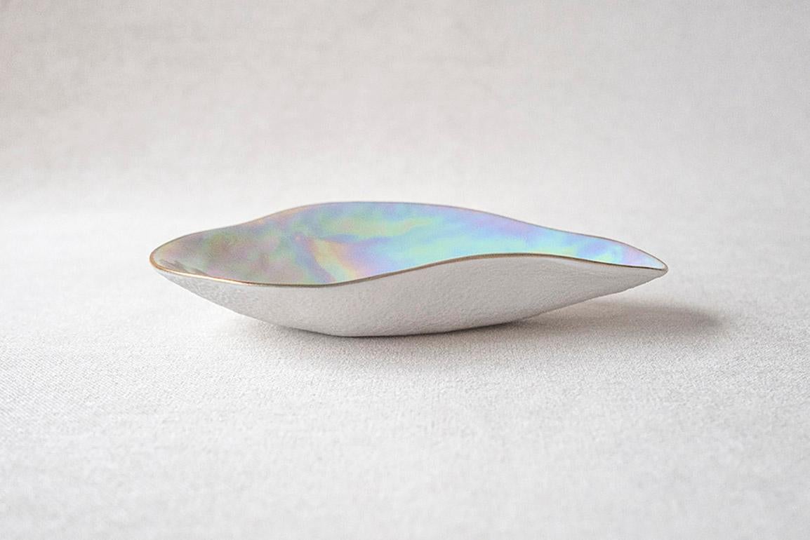 This luxurious contemporary tableware is hand made in France, in a small traditional porcelain manufacturer in Limoges, ensuring the highest quality. 
Go to my storefront to see a video of the making process!

• small porcelain side dish
• 16cm x