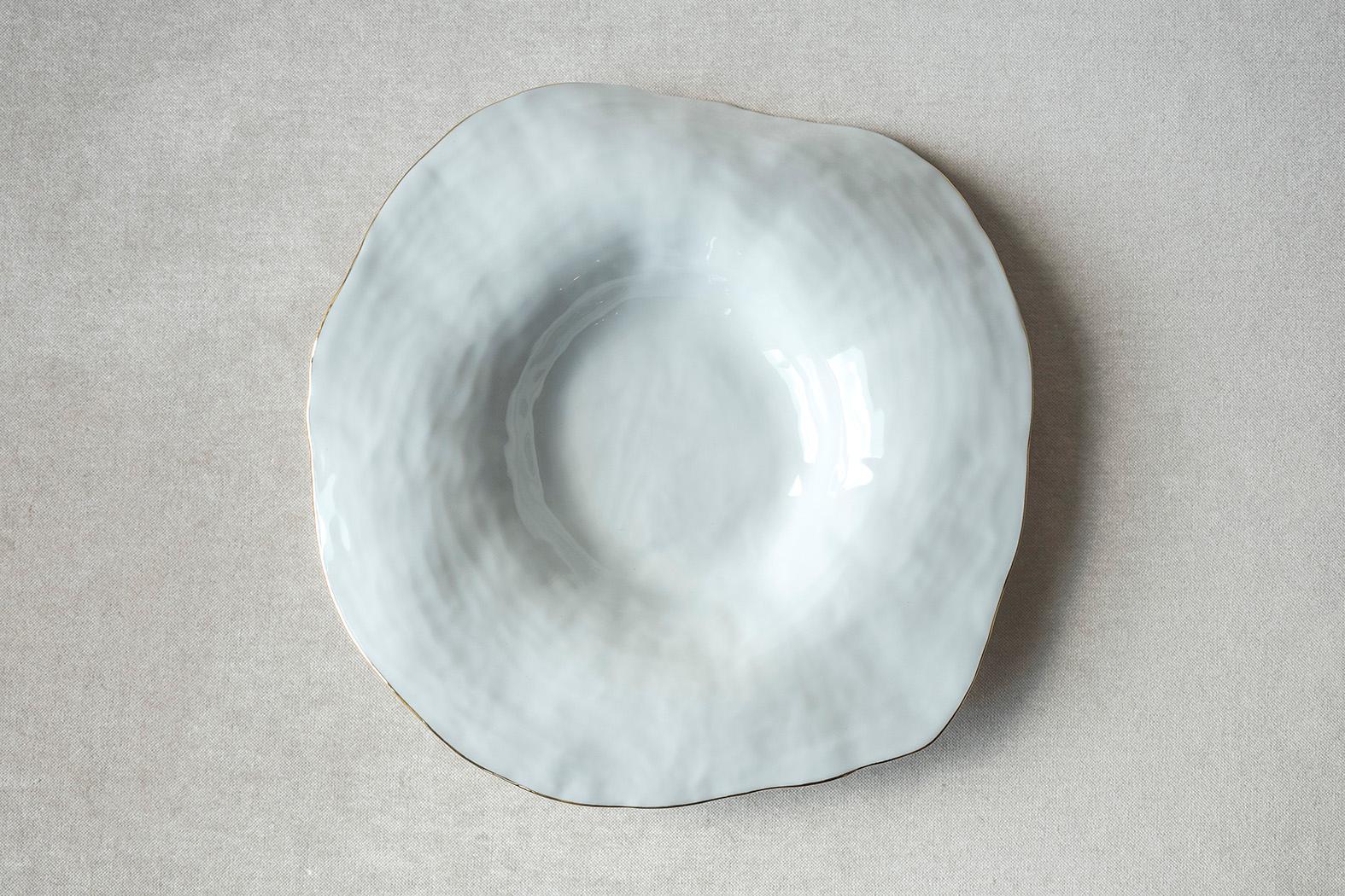 • Large deep dinner plate
• measures 30cm x 30cm x 3,5cm
• perfect for meticulous main dishes
• also works for fancy pasta or chique soup
• glazed white, textured bottom
• with a very luxurious 24k golden rim
• designed in Amsterdam / handmade