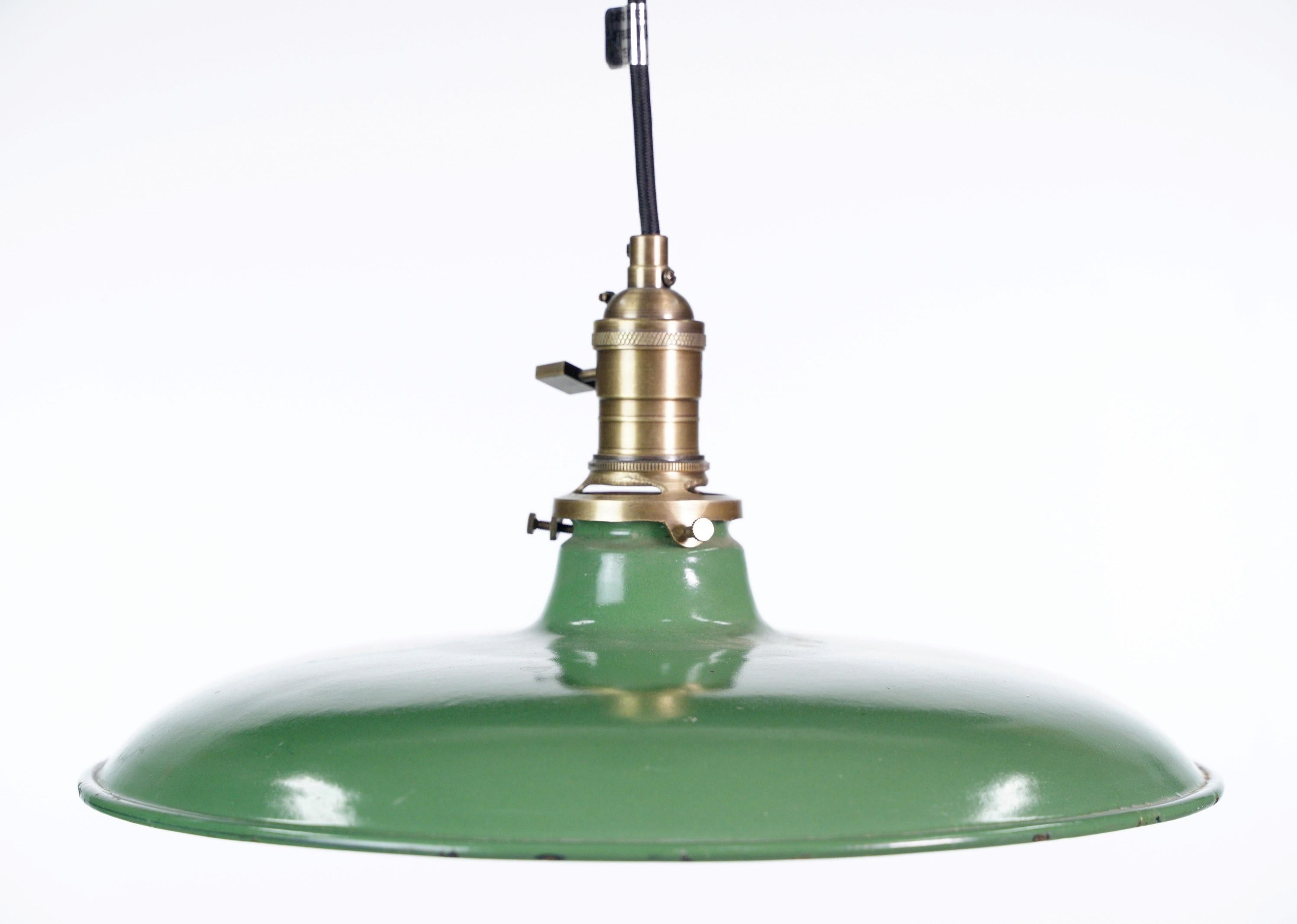 The Industrial steel green & white black cord pendant light is a striking combination of colors and materials. The green and white shade creates a bold visual contrast, while the black cord adds a touch of modernity. This pendant light is a