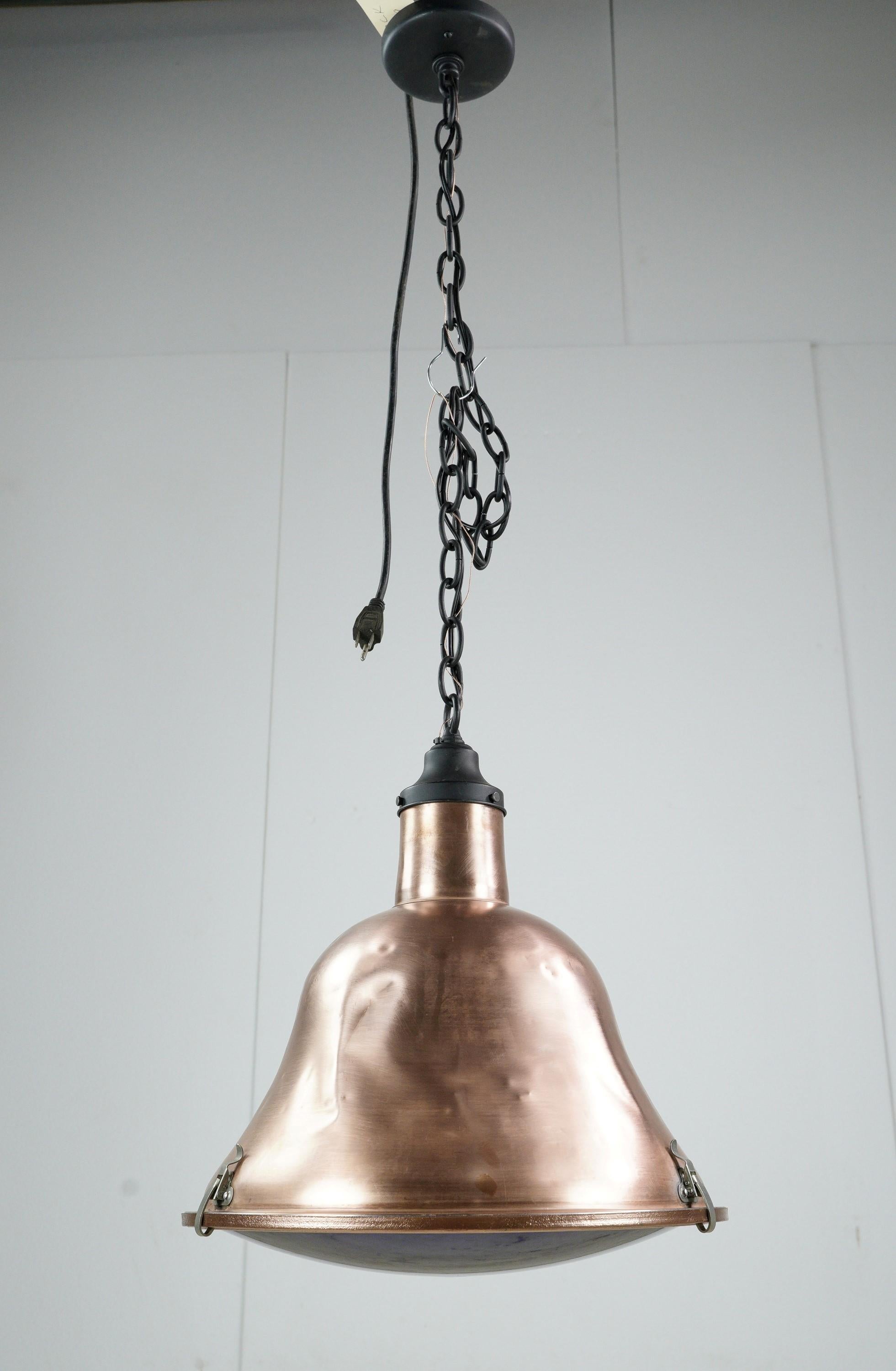 Reclaimed copper pendant light with a blackened brass frame and steel chain. Cleaned and restored. They are in good condition. The price includes restoration of cleaning and rewiring. Small quantity available at time of posting. Please inquire.