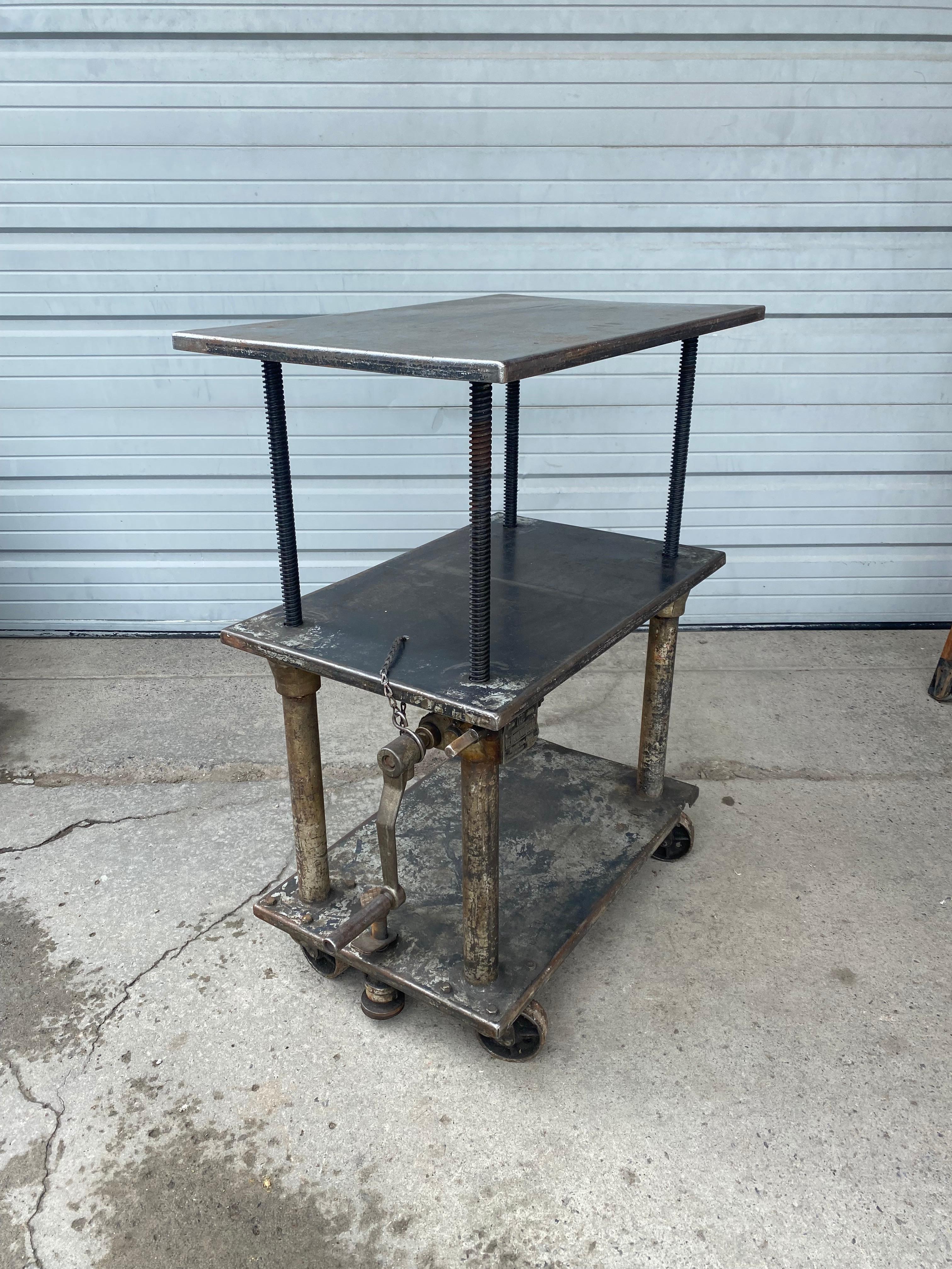 Industrial 3-tiered chain drive adjustable steel table / bar cart/ factory lift, made by the hamilton tool company, amazing, ingenious design, featuring smooth, effortless crank, chain mechanism., wonderful Industrial Design, adjustable height from