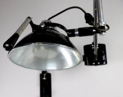 Industrial Adjustable Wall Mount Dental Light by the Wilmont Castle Co.