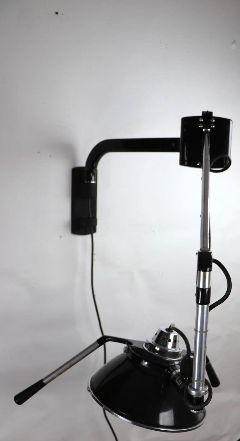 American Industrial Adjustable Wall Mount Dental Light by the Wilmont Castle Co.