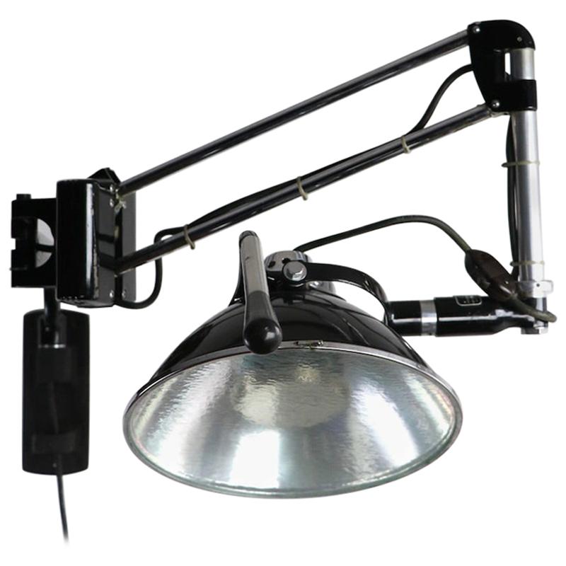 Industrial Adjustable Wall Mount Dental Light by the Wilmont Castle Co.