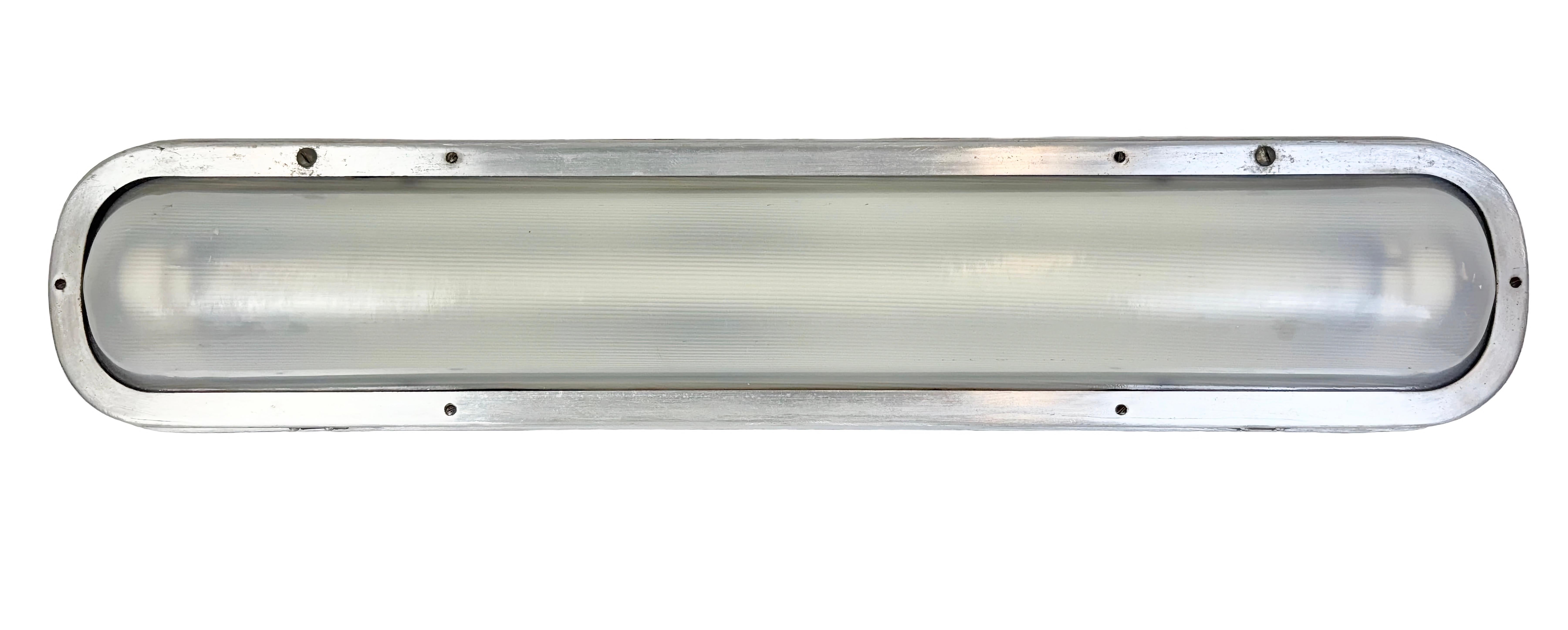 This industrial tube light was made in former Czechoslovakia during the 1970s. These lights were used in Czechoslovak trains called “PANTOGRAF” It is made of an aluminium and a plastic glass The light is converted into one Led T8, 60 cm light tube.