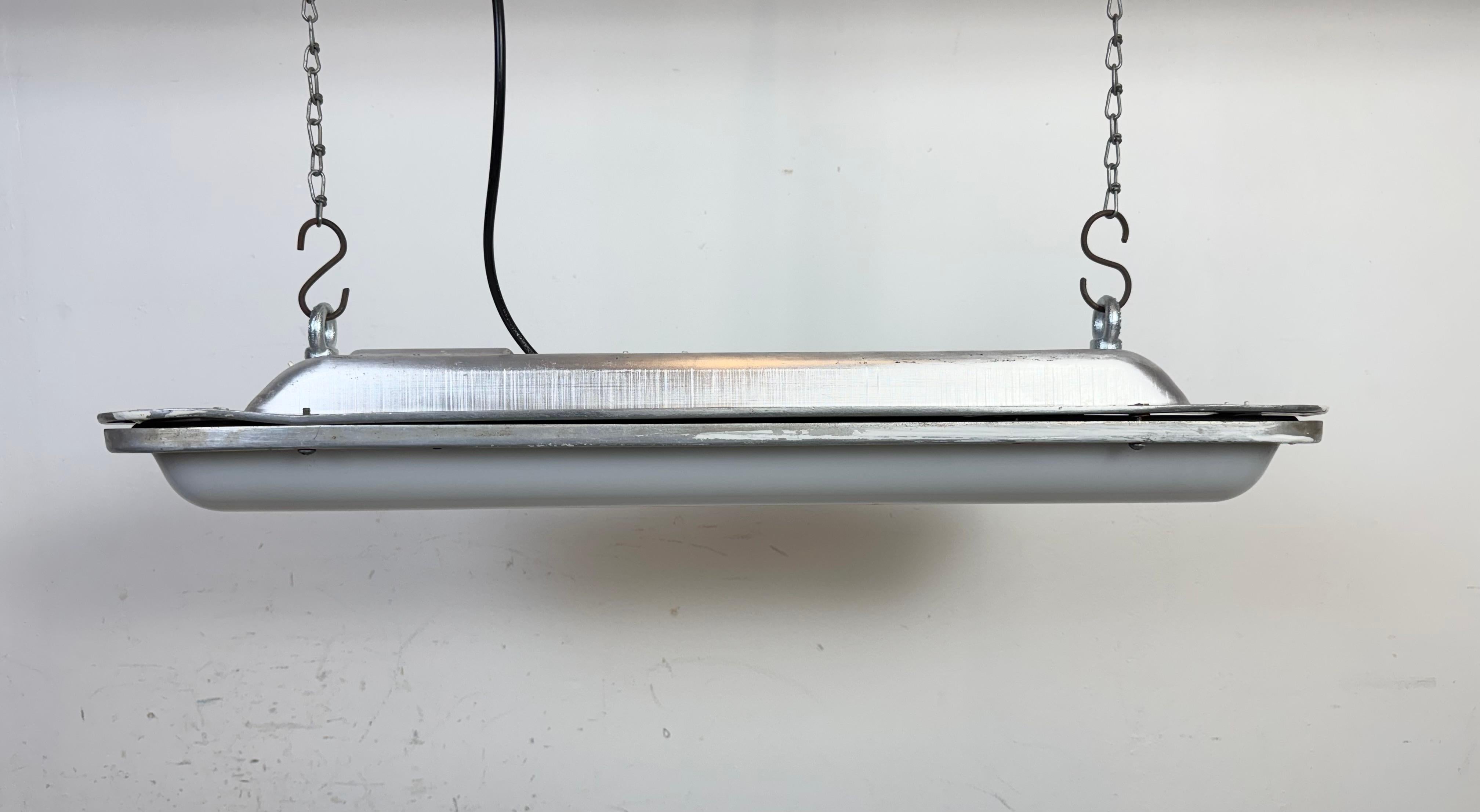 This industrial tube light was made in former Czechoslovakia during the 1970s. These lights were used in Czechoslovak trains called “PANTOGRAF” .It is made of an aluminium and a milk plastic glass The light is converted into one Led T8, 60 cm light