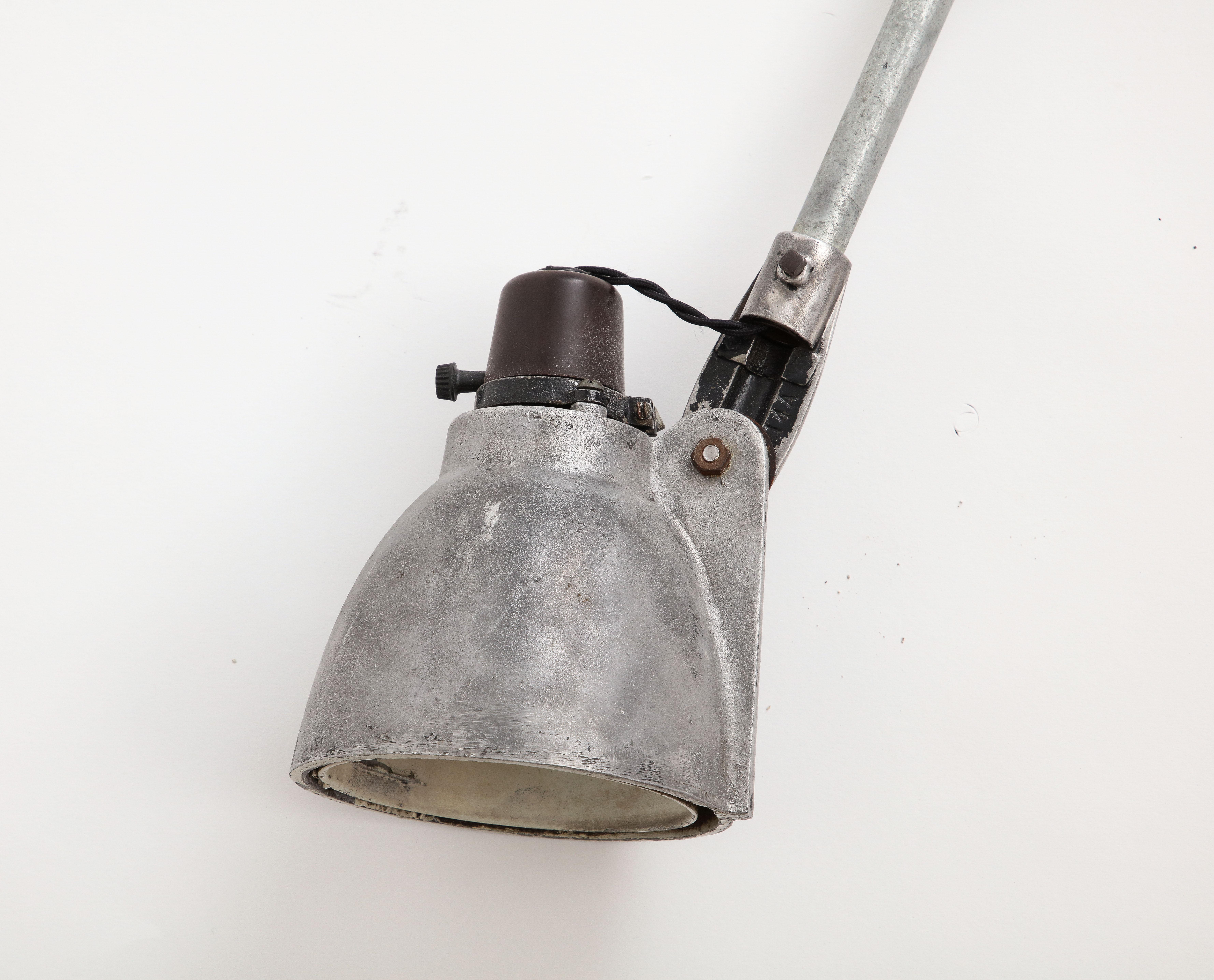 Metal Industrial Anglepoise Wall Mounted Cast Iron Sconce, c. 1940 For Sale