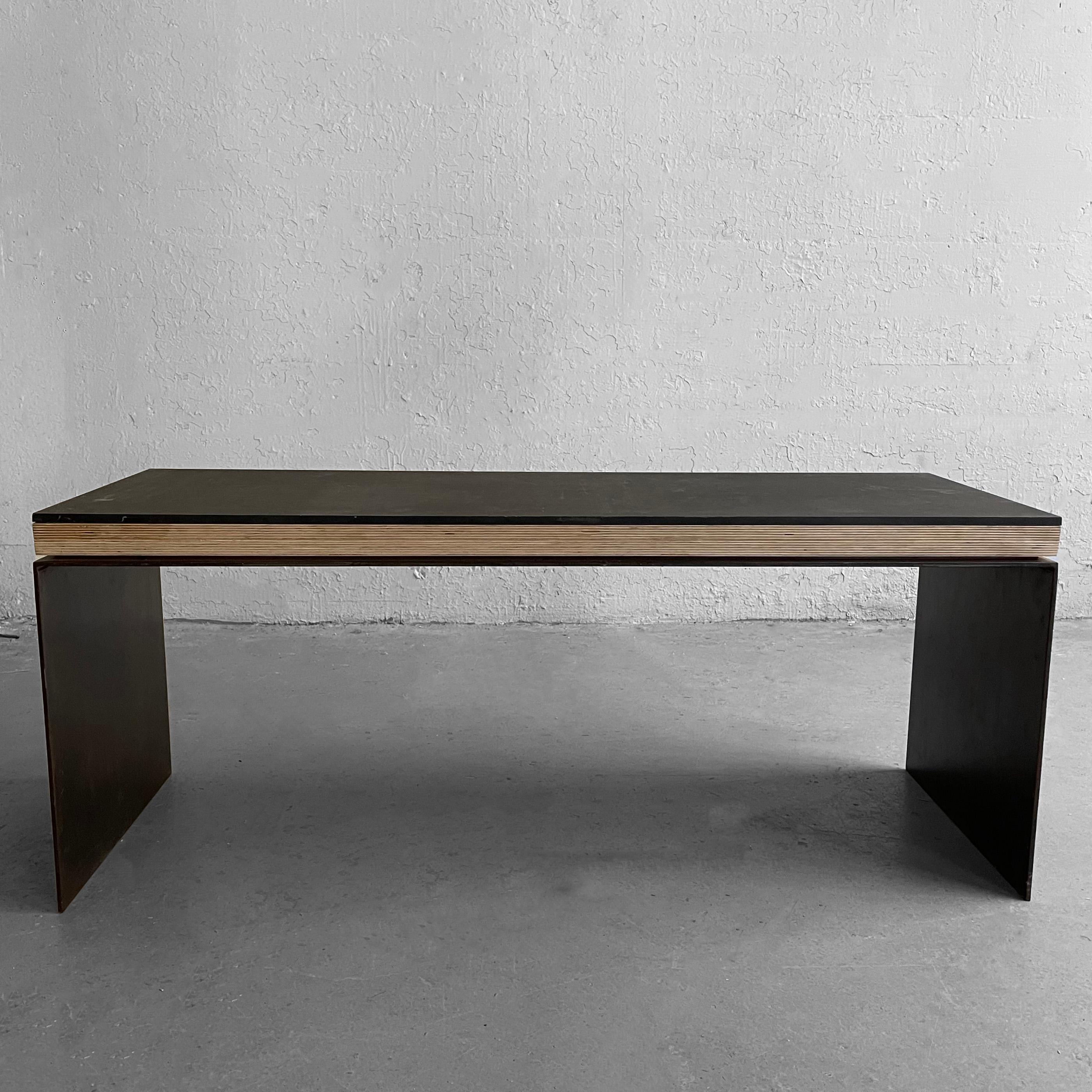 Well crafted, artisan-made, industrial coffee table or bench features a patinated steel base with natural, marine plywood and black acrylic top.