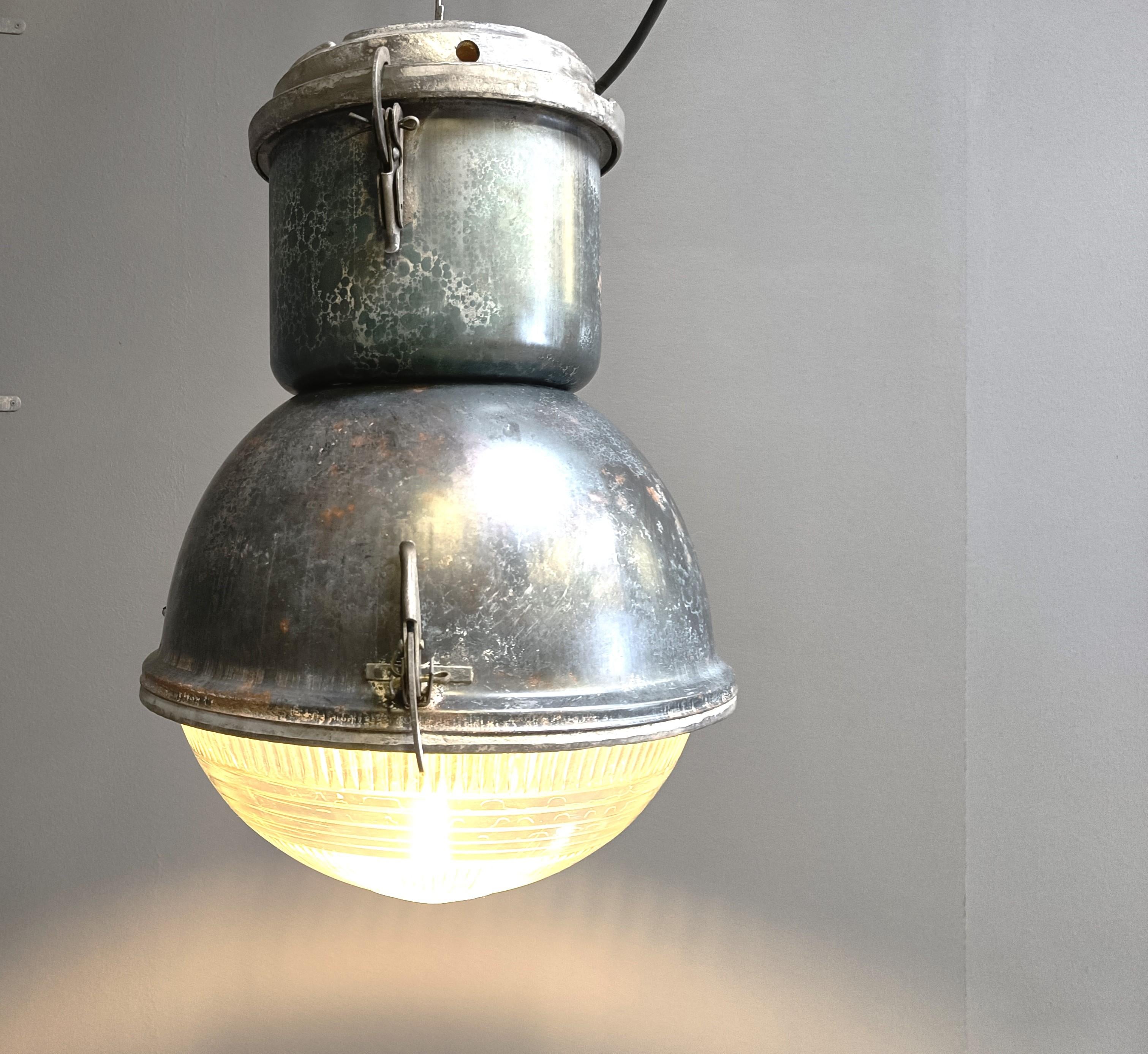 Industrial 'ball' lamps with prismatic glass. They would have been used as street lamps.
 
These Industrial lamps give a beautiful light thanks to the prismatic glass.

The lamps have a nice industrial look and would be a lovely contrast for a
