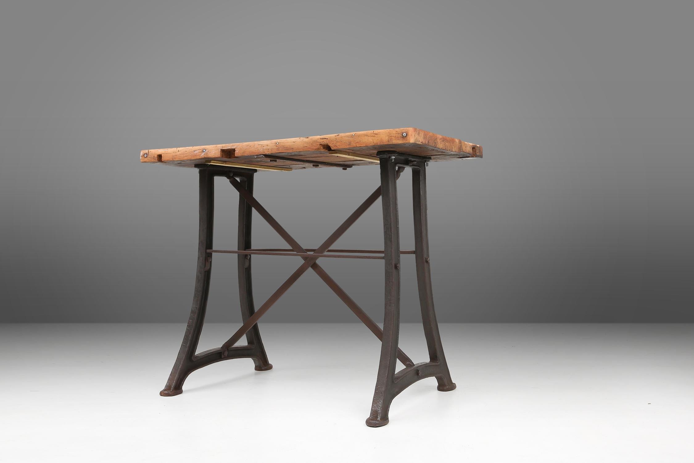 Industrial bar/bistro table with cast iron legs and wooden top, Belgium ca. 1920 1
