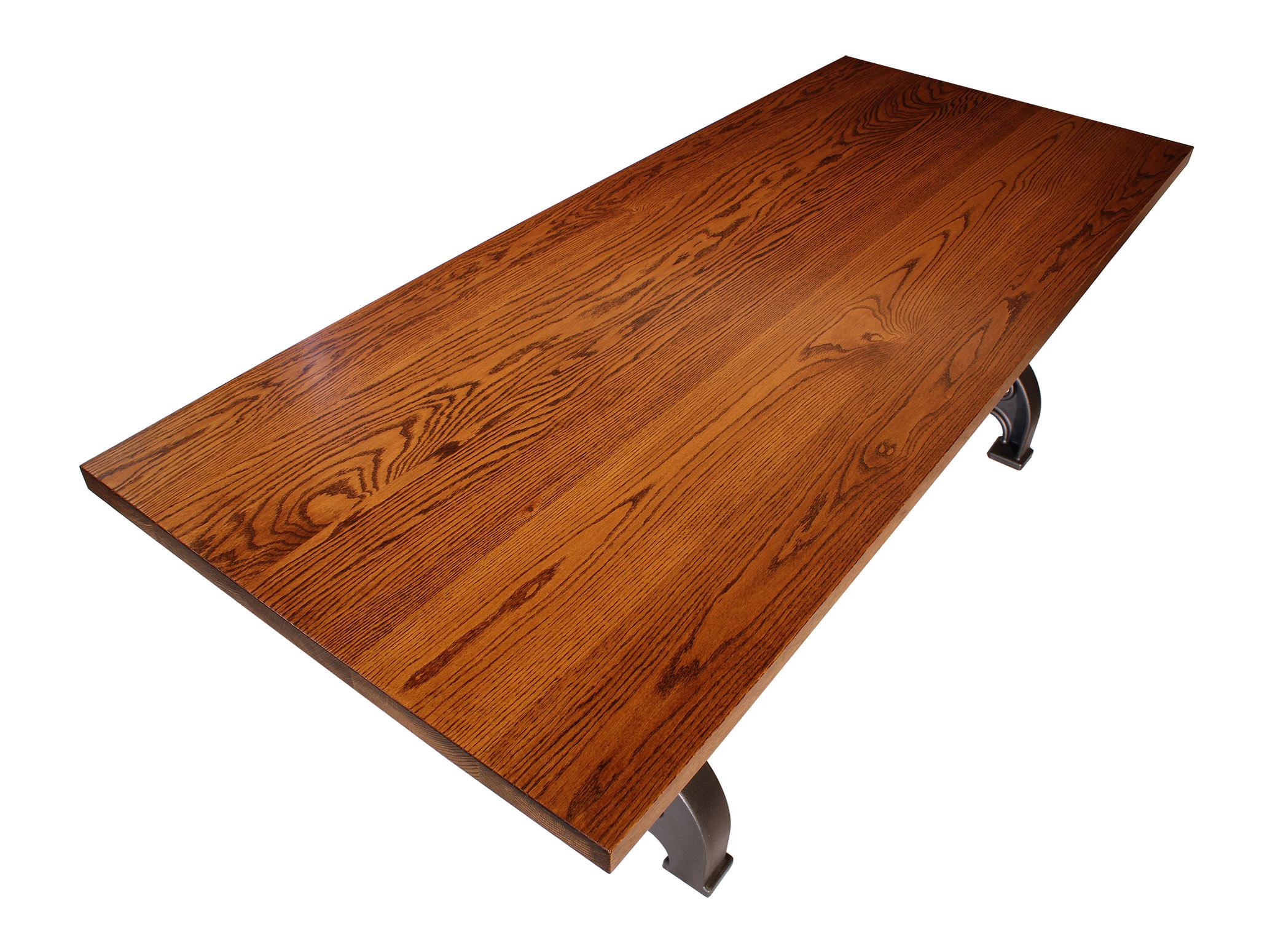 Industrial hand-built dining, conference, great table on American made cast iron legs and steel stretcher. Shown in white oak with golden finish. Custom made to your specifications. Table shown measures 96