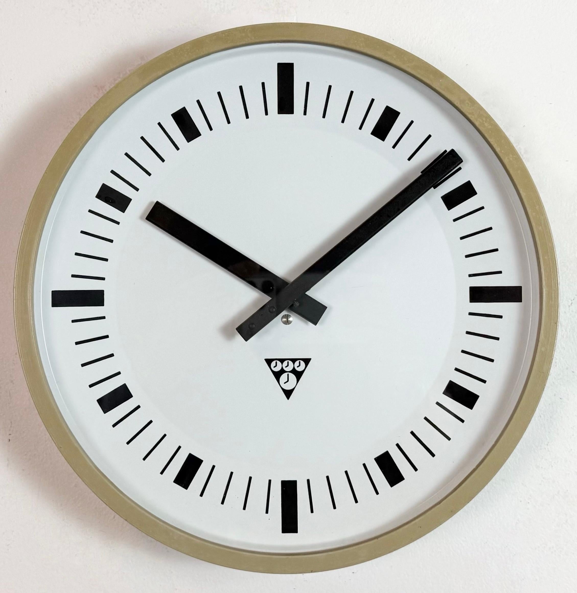 Czech Industrial Beige Bakelite Wall Clock From Pragotron, 1970s For Sale