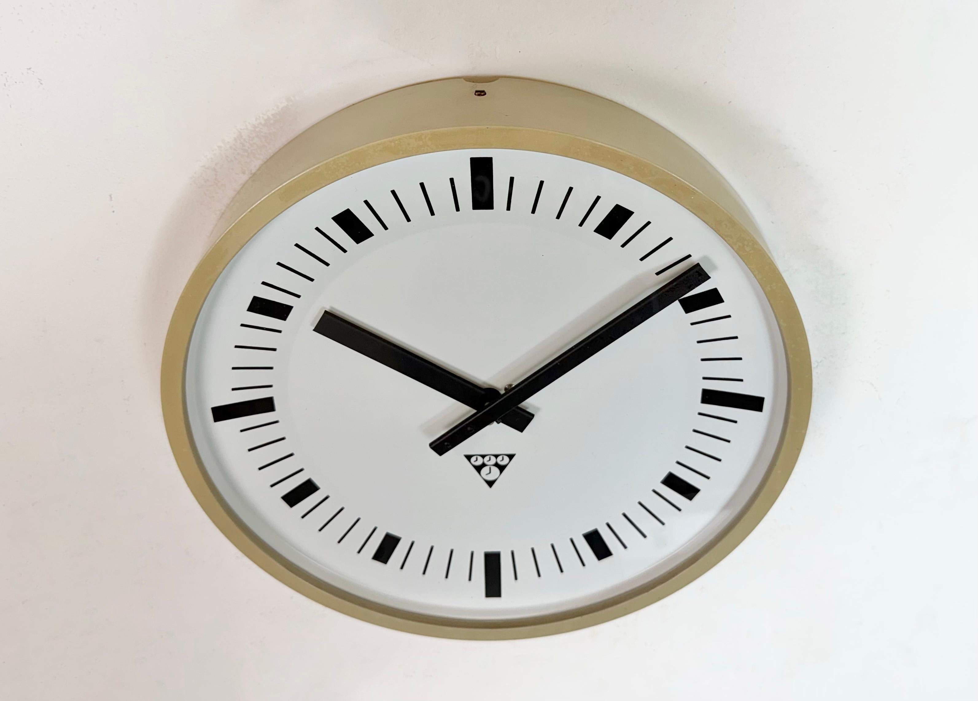 Aluminum Industrial Beige Bakelite Wall Clock From Pragotron, 1970s For Sale