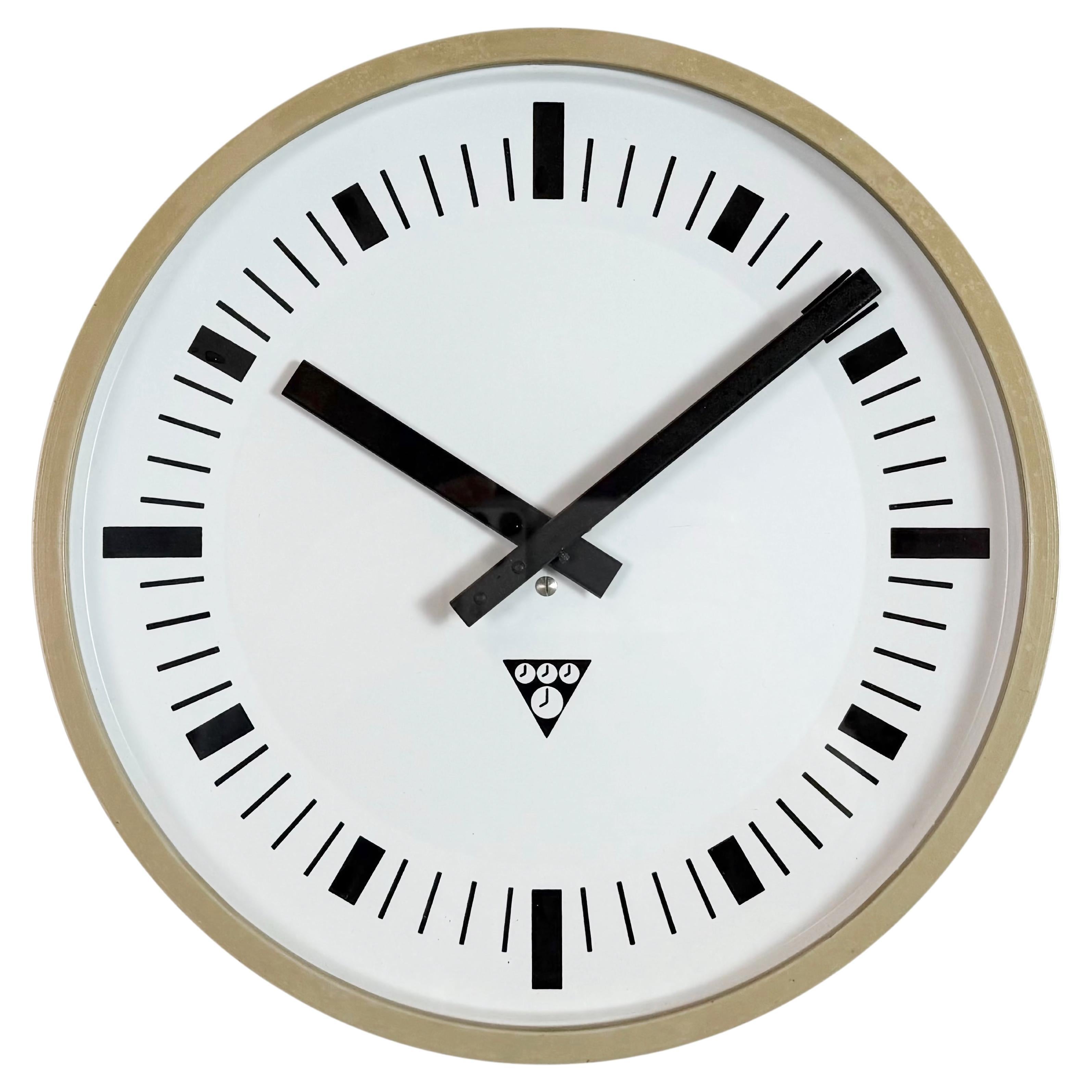 Industrial Beige Bakelite Wall Clock From Pragotron, 1970s For Sale