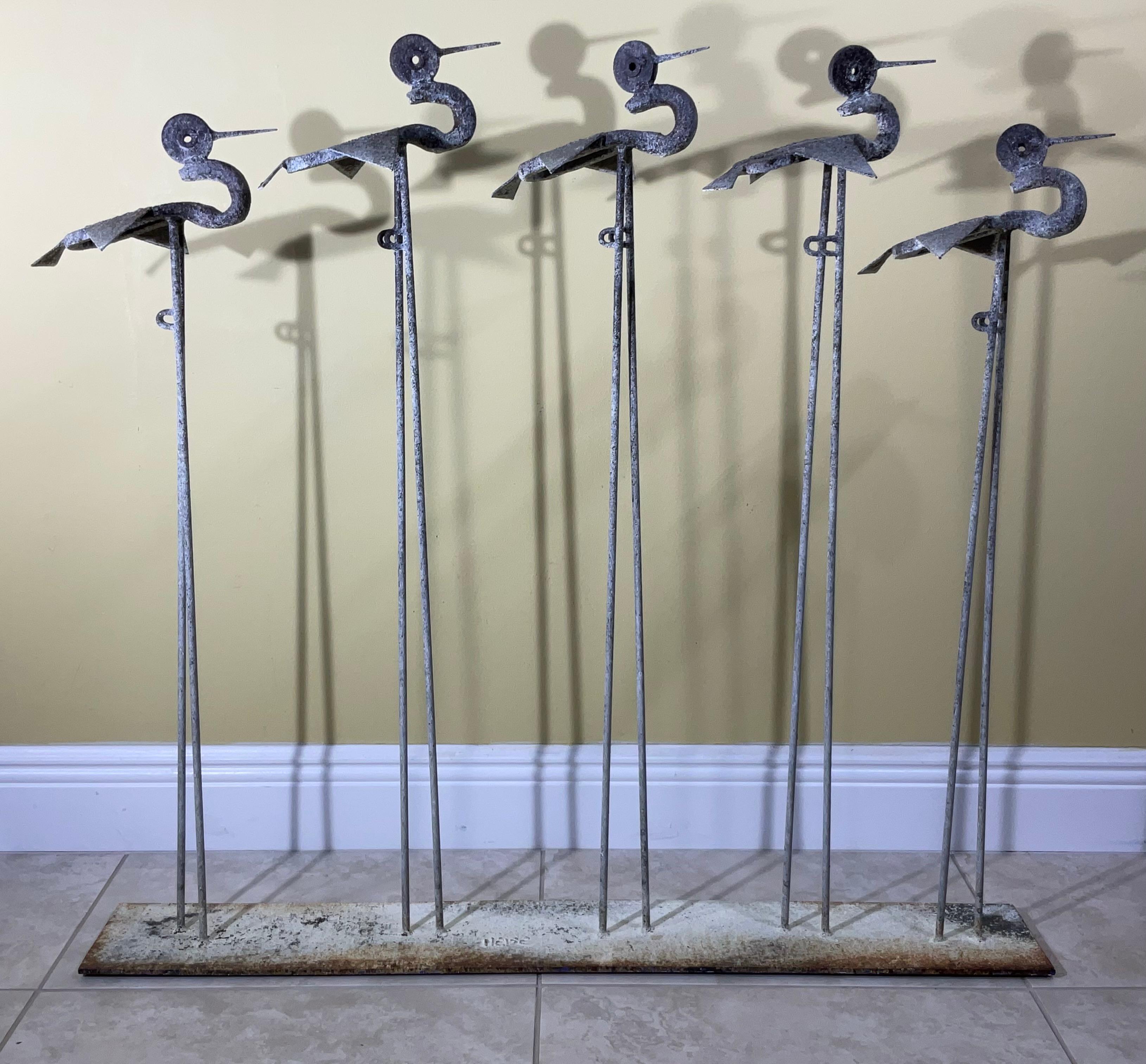 
Exceptional artistically made Industrial five Bird Sculpture art , from of solid iron , could use as sculpture decoration ,or as fireplace screen.
Professionally rust treated and seal , great looking patina .
This metal art sculpting involves many