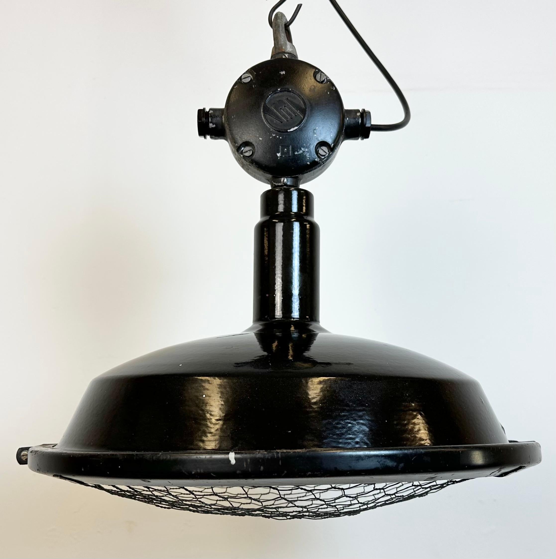 Czech Industrial Black Enamel Factory Pendant Lamp with Protective Grid, 1950s For Sale