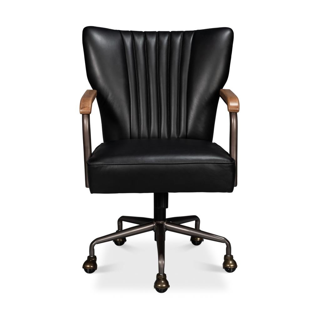 A modern industrial-style swivel desk chair with channel quilting onyx black leather upholstery on a metal frame with wooden armrests.
Dimensions: 25