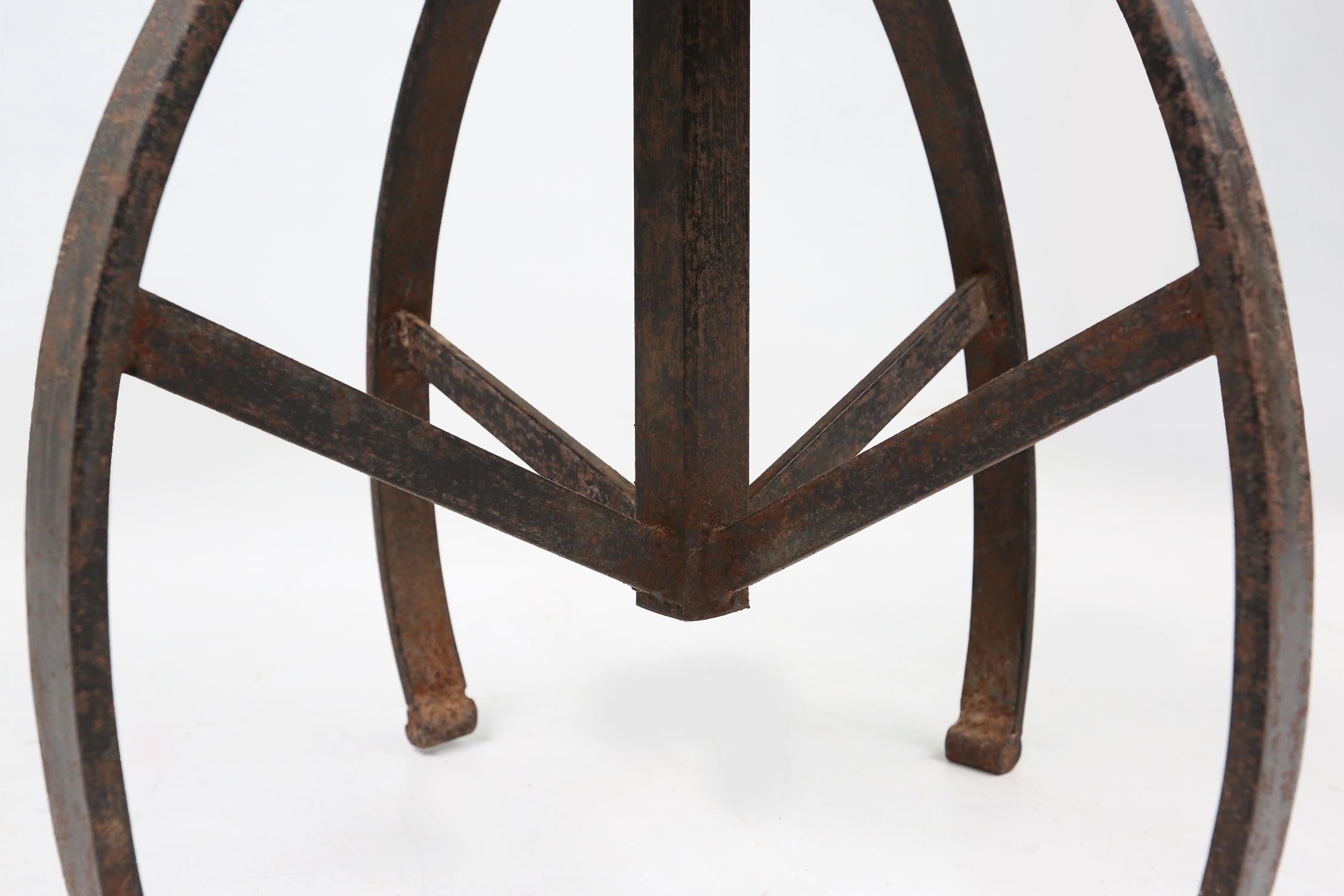 Early 20th Century Industrial black metal stool with unique frame, France ca. 1920 For Sale