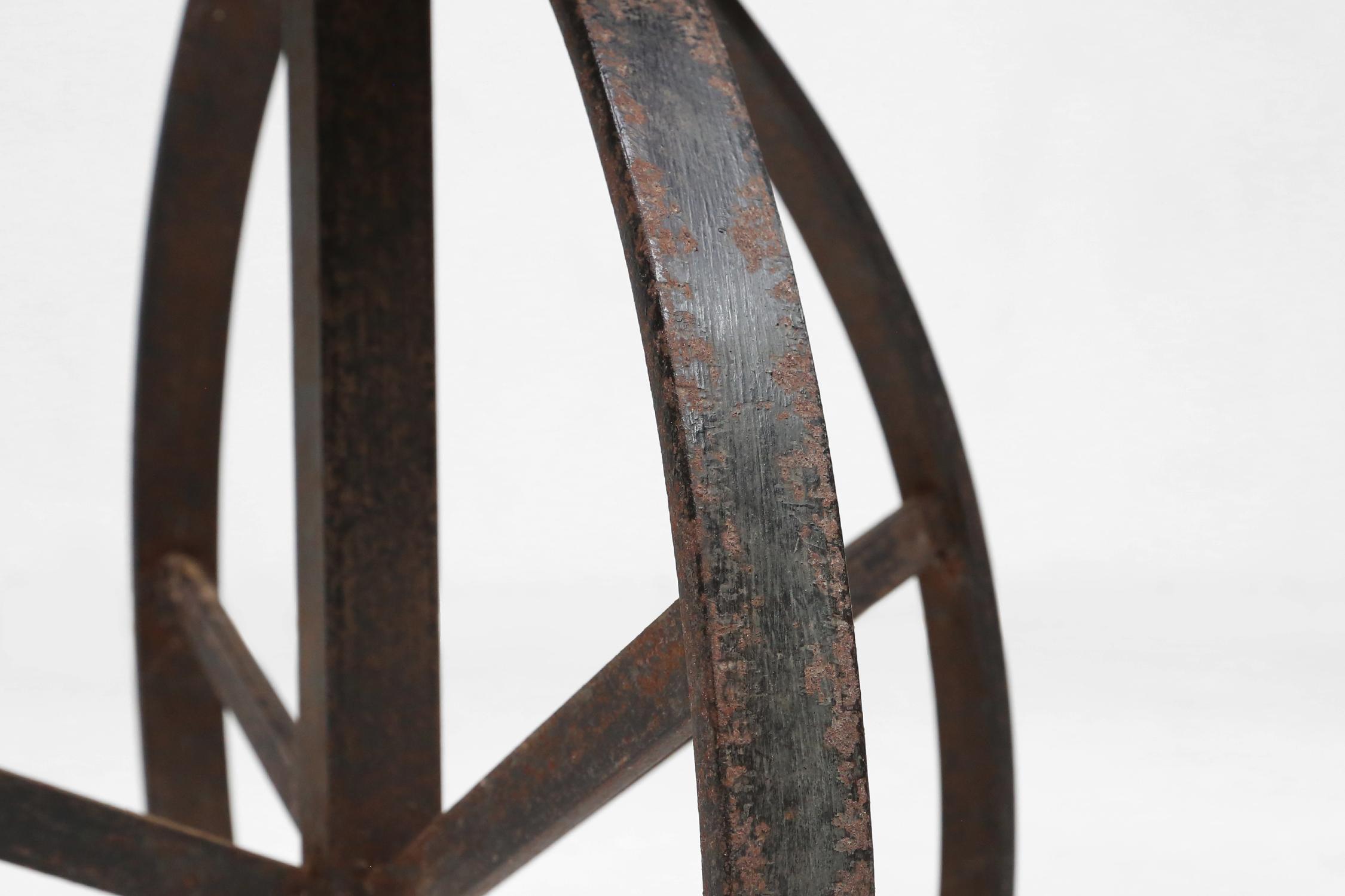 Metal Industrial black metal stool with unique frame, France ca. 1920 For Sale