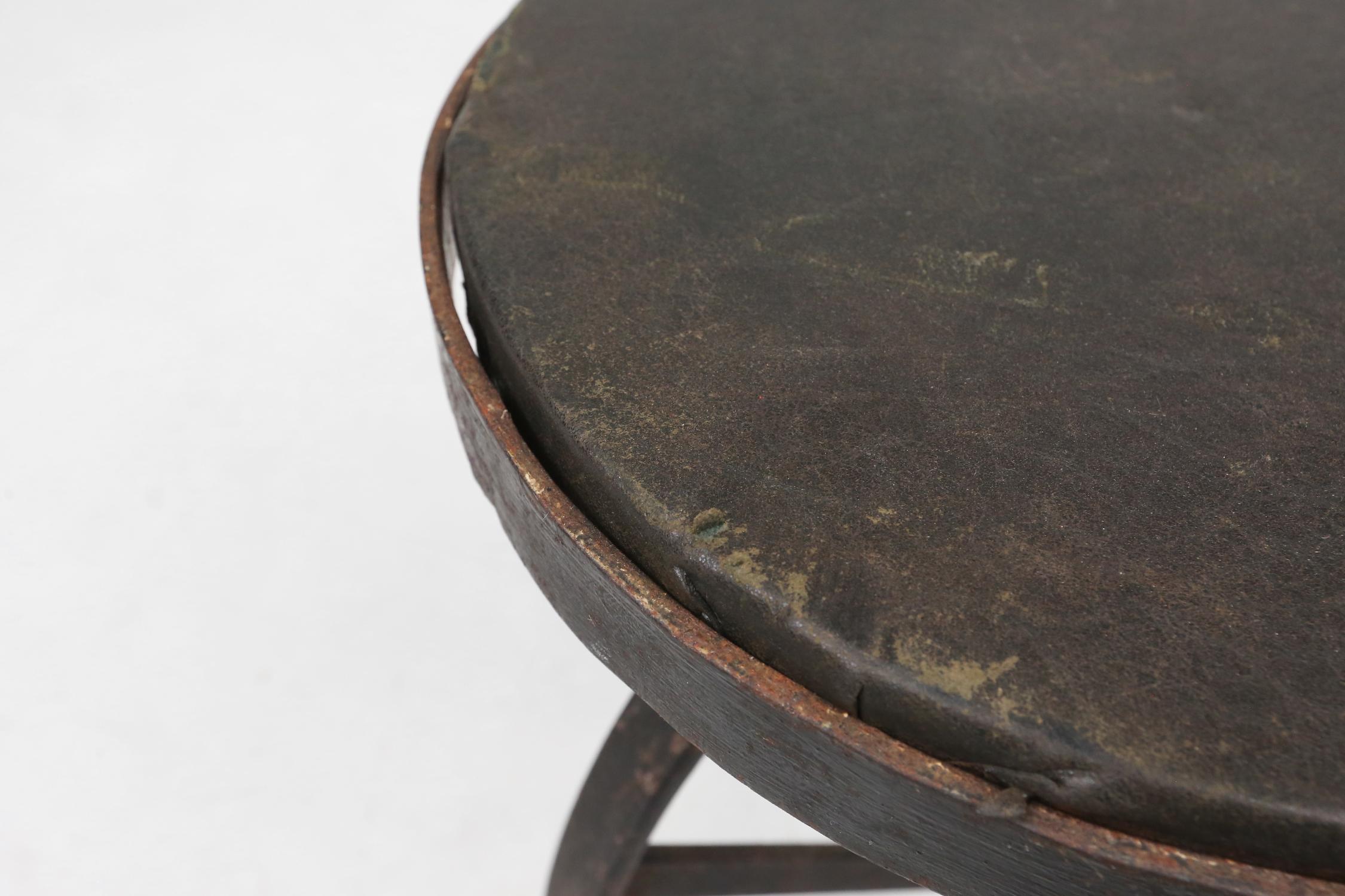 Metal Industrial black metal stool with unique frame, France ca. 1920 For Sale