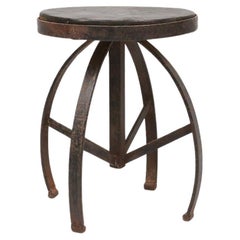 Industrial black metal stool with unique frame, France ca. 1920