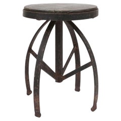 Industrial black metal stool with unique frame, France ca. 1920