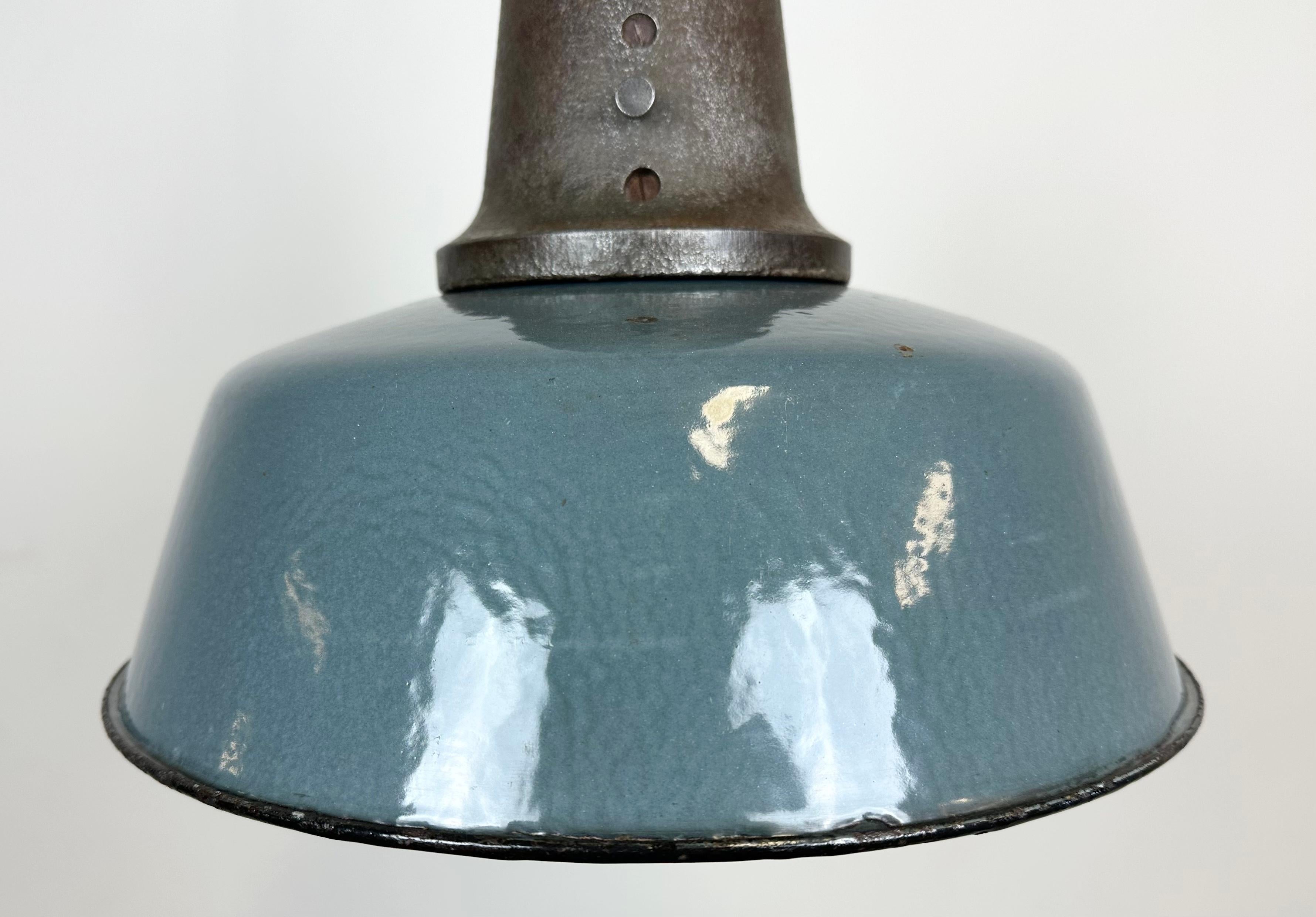 Industrial Blue Enamel Factory Pendant Lamp with Cast Iron Top, 1960s In Good Condition In Kojetice, CZ