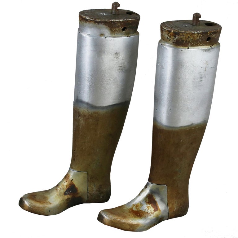 Industrial Boot Molds made in Aluminium and Steel. Super cool and sculptural. Really heavy iron Industrial boot molds. Vintage industrial design does not get much better than this. Made in Sweden for size 36.
