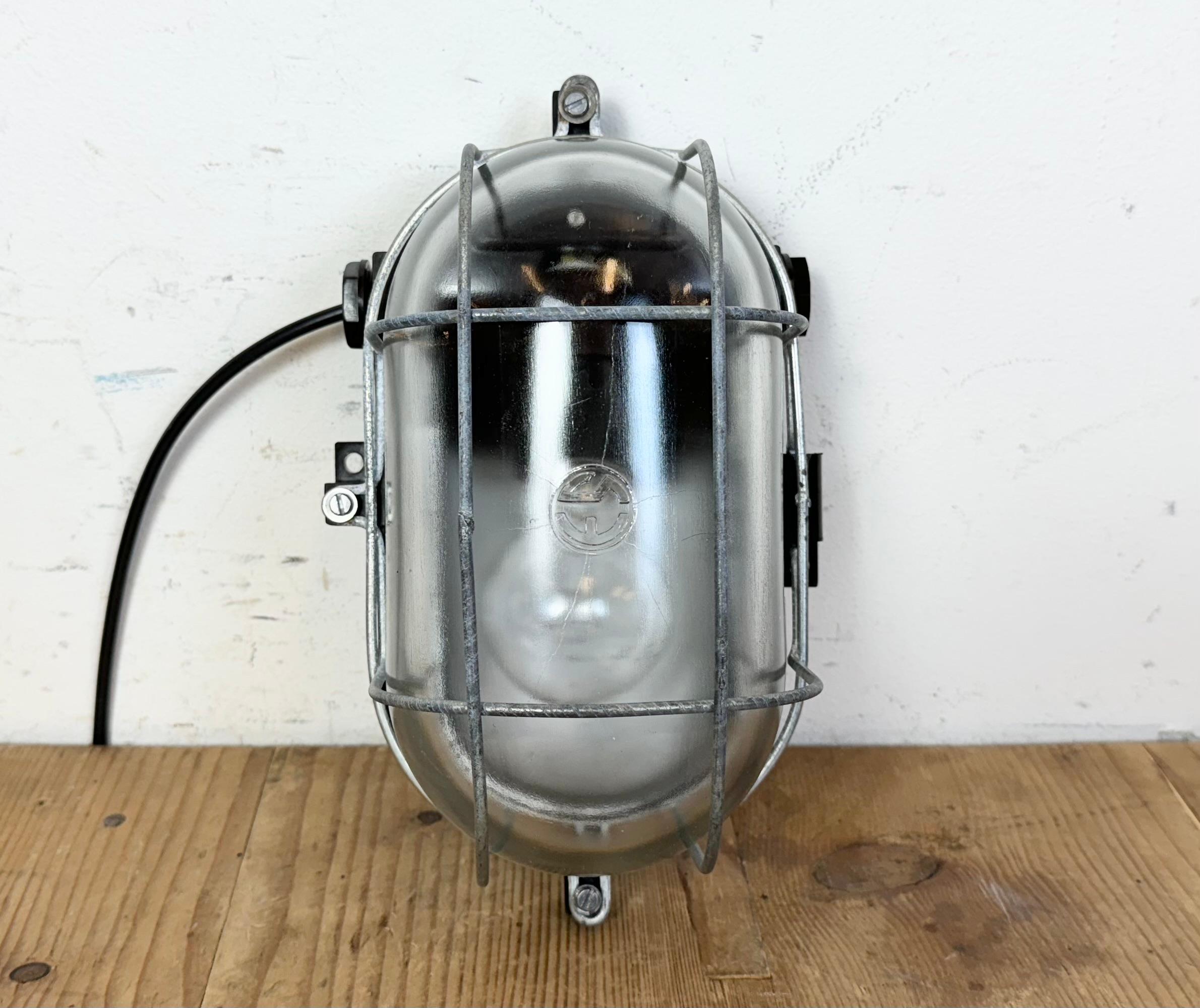 Czech Industrial Brown Bakelite Wall Light with Clear Glass, 1960s For Sale
