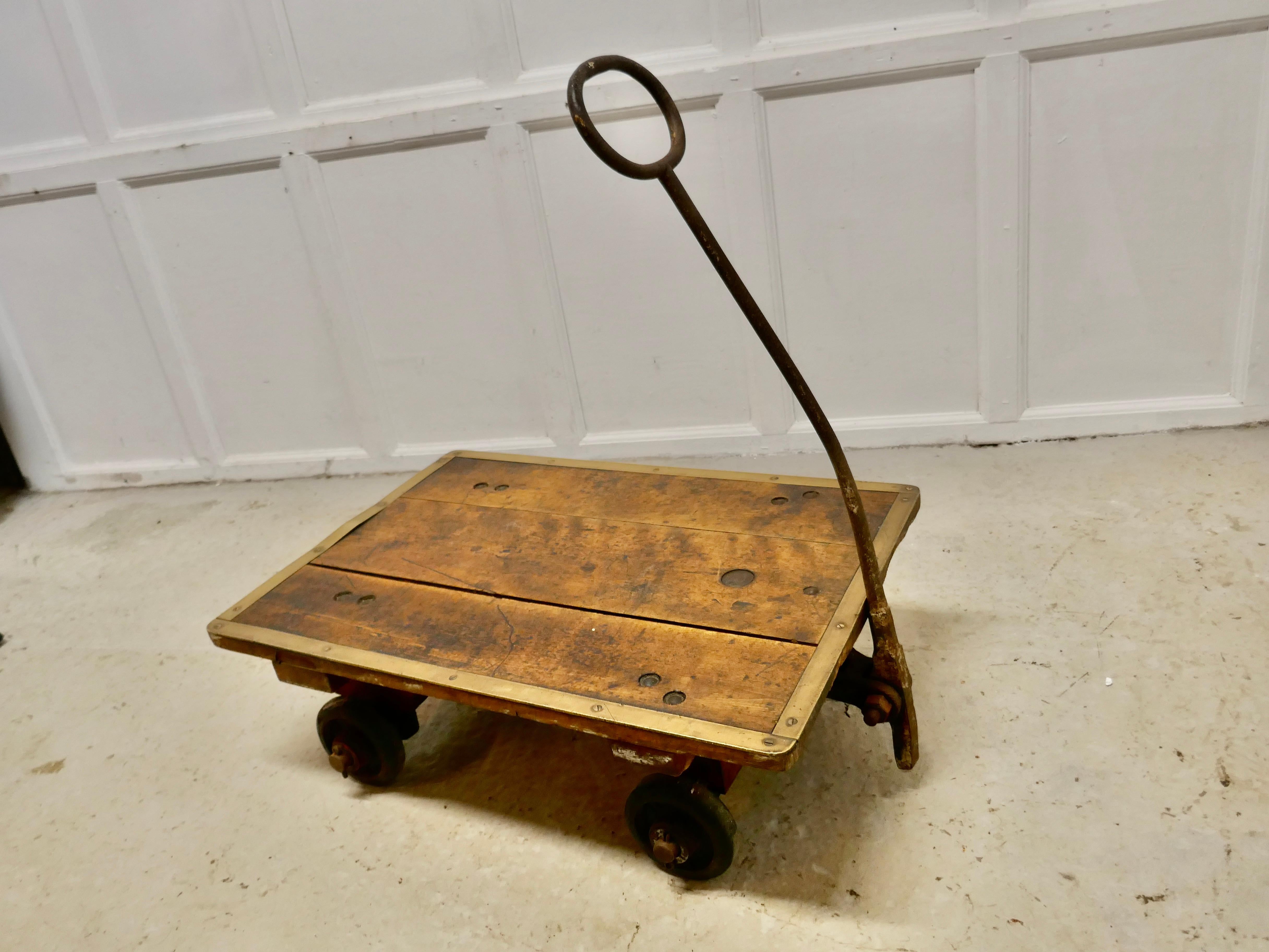 Industrial bullion and coin, bank cart trolley by Slingsby

This a piece from our cash fueled past, from a time before electronic banking

This is a very sturdy piece and a very heavy piece (after all it was made to carry gold and silver