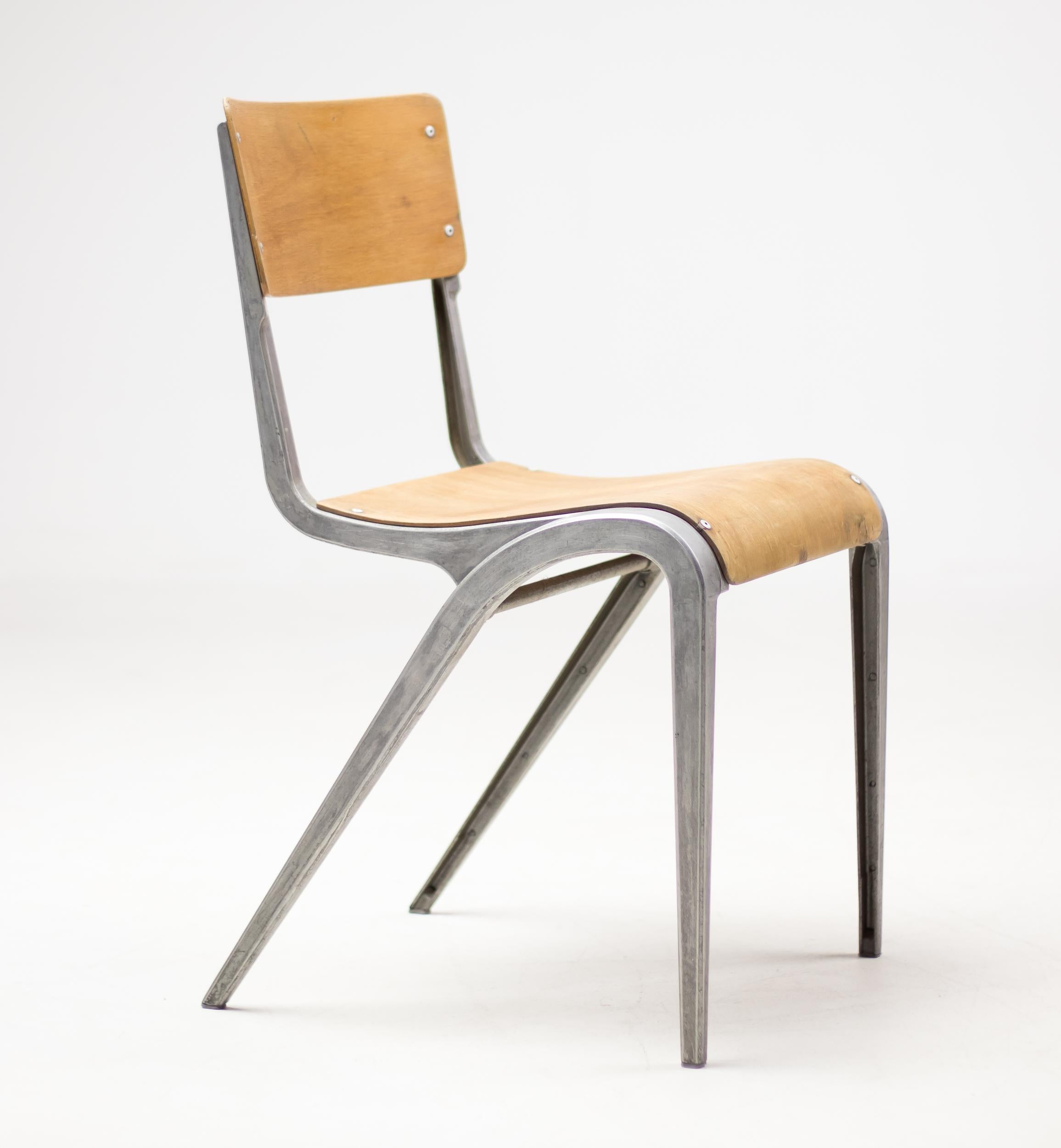 Cast aluminum side chair by James Leonard for Esavian with bent plywood seat and back.