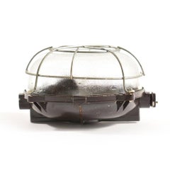 Industrial Ceiling/Wall Light in Bakelite and Glass with Metal Cage, circa 1950