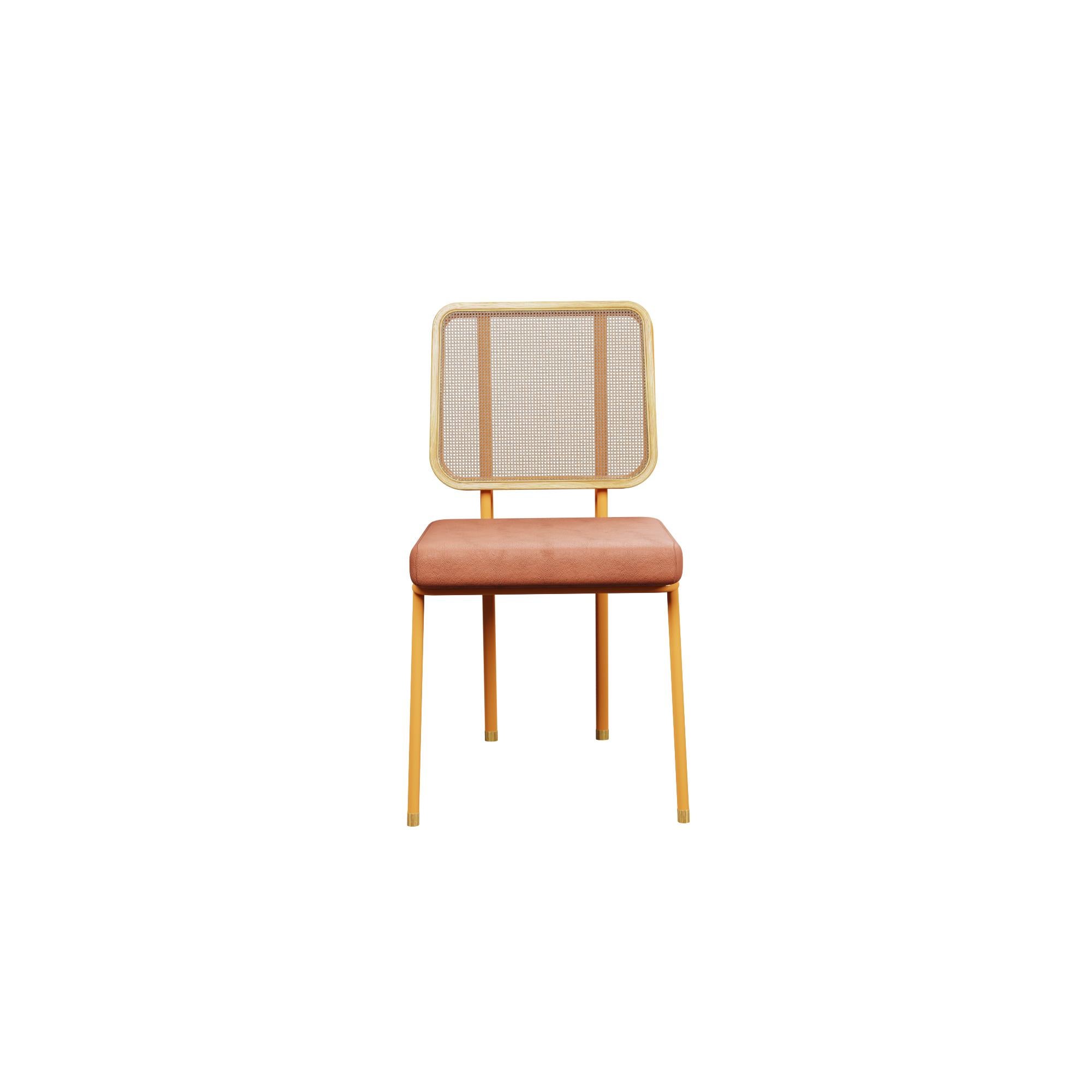 Murmurio's DUV sturdy iron structure provides a solid foundation, while the intricately woven rattan backrest, supported by an ashwood frame, adds a touch of natural beauty. The seat is upholstered in genuine leather, offering both comfort and a
