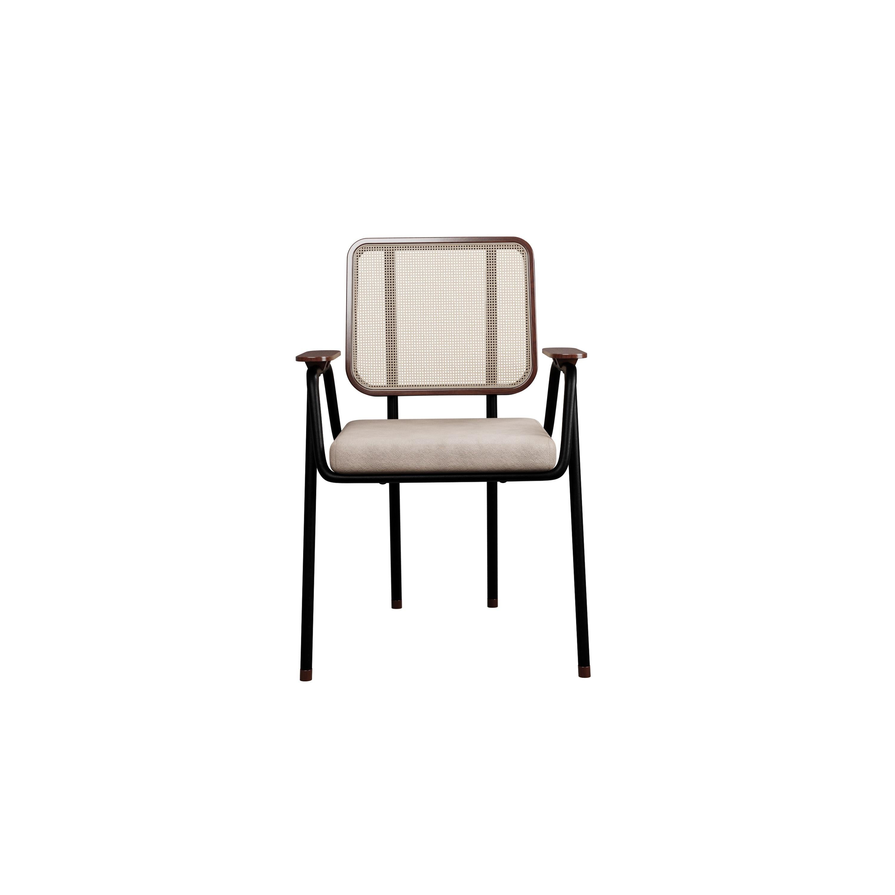 Murmurio's chair with arm DUV sturdy iron structure provides a solid foundation, while the intricately woven rattan backrest, supported by an ashwood frame, adds a touch of natural beauty. The seat is upholstered in genuine leather, offering both