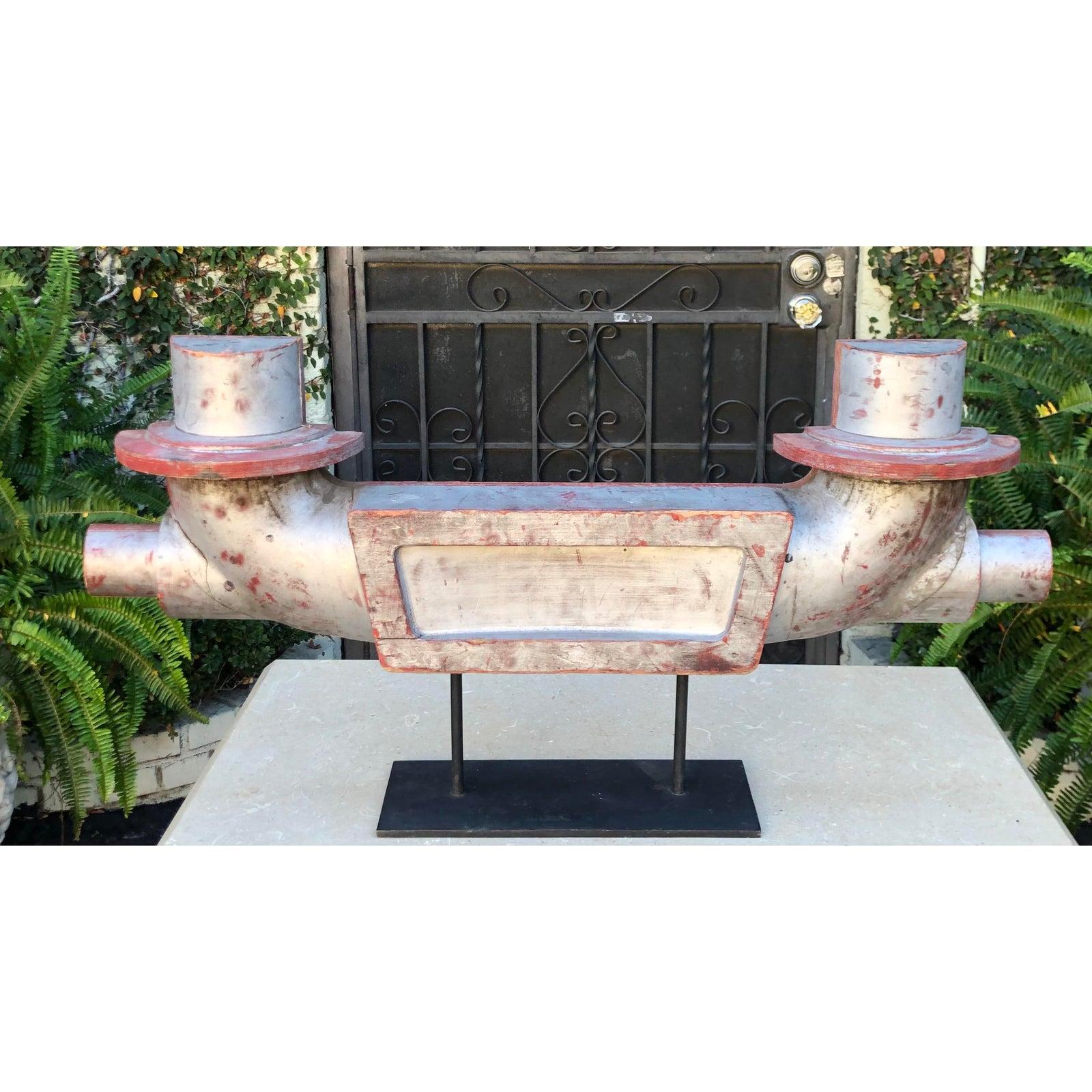 Industrial Chic Steampunk carved wood Art Deco sculpture.

Additional information:
Materials: Wood
Color: Silver
Art Subjects: Abstract
Period: 1940s
Styles: Art Deco, Industrial
Item Type: Vintage, Antique or Pre-owned
Dimensions: 39