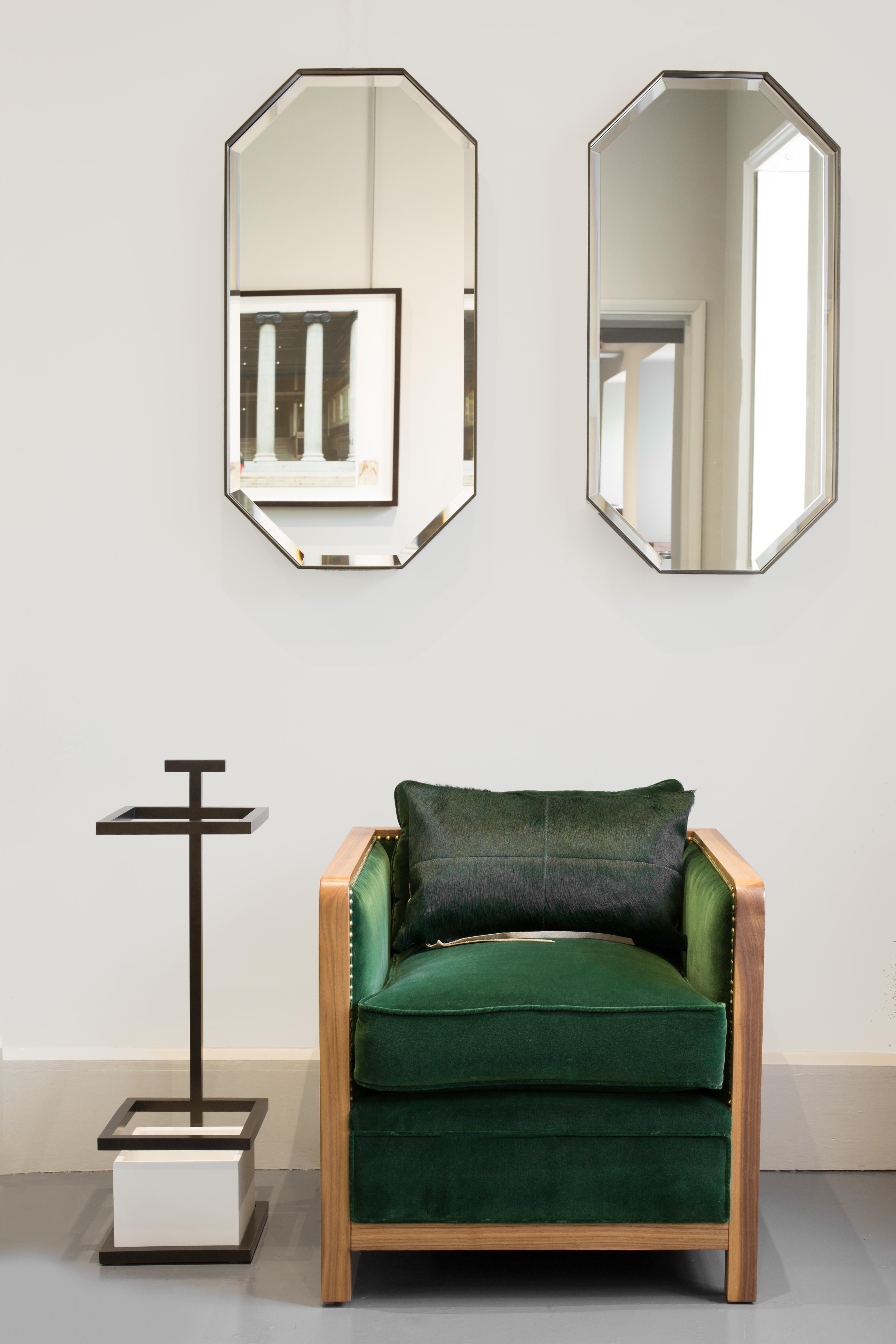 Mirrors are sometimes overrated with lack of design and personality. Eros defies these ideas with a antique-style mirror and a delicate, beveled Art Deco frame available in solid brass as well as steel powder-coated. Designed to be displayed in