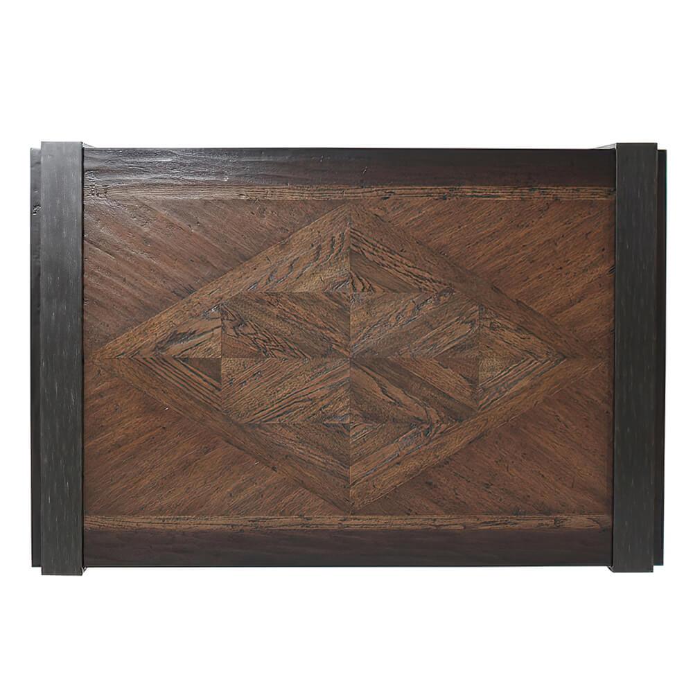 Modern industrial parquetry top mahogany and oak coffee table with antique blackened steel supports.
  