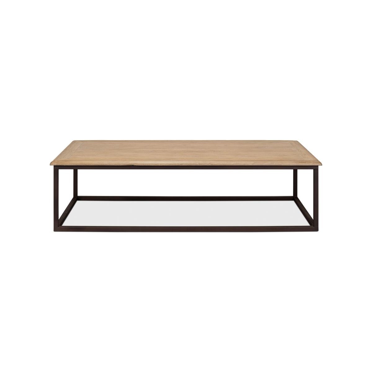 Ein großer Tisch mit einer rechteckigen Platte aus recyceltem Holz in einem Parkettmuster, kombiniert mit altem Eisen in Würfelform, das diesem rechteckigen Tisch ein gutes Aussehen verleiht

Abmessungen: 72