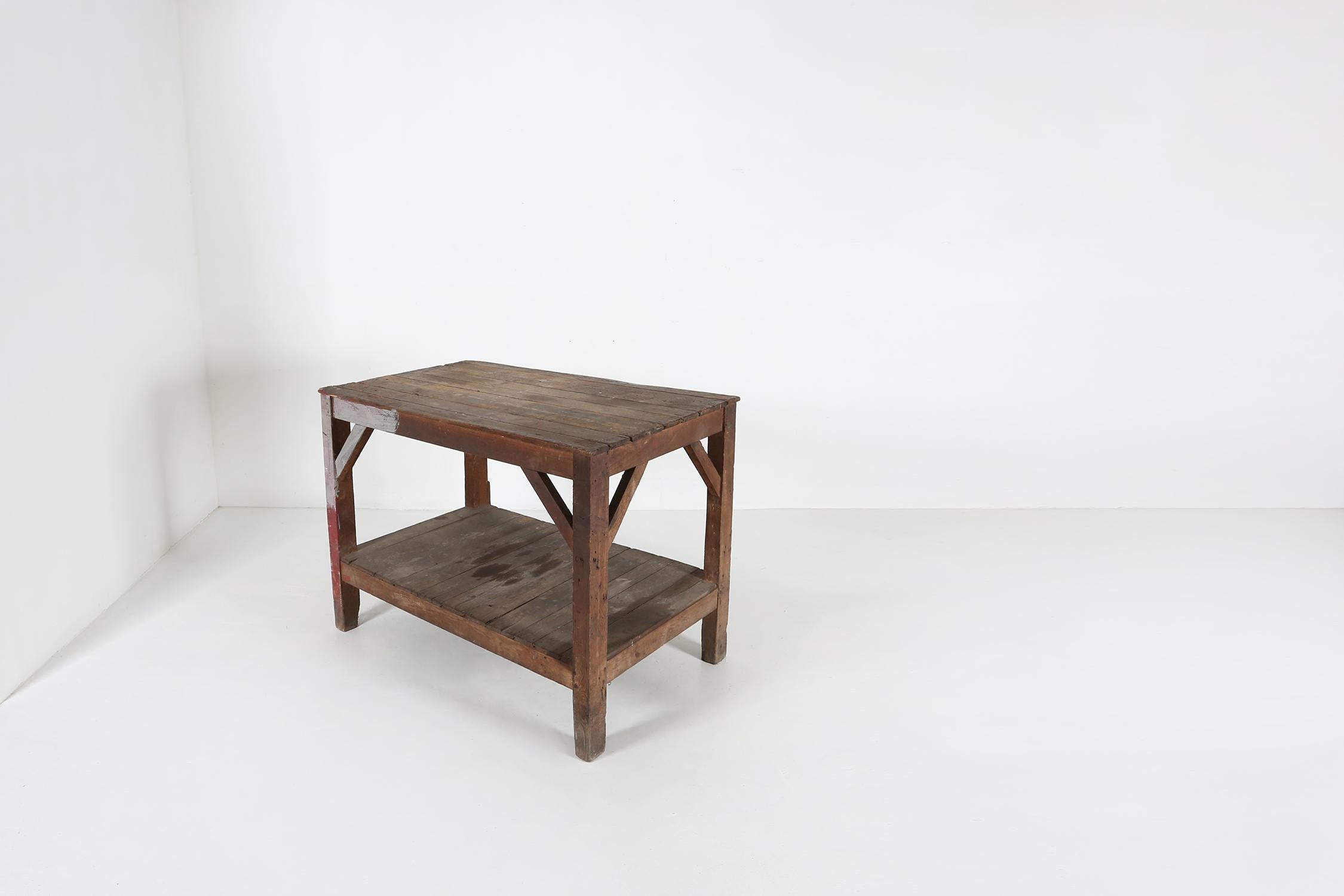 Solid wooden industrial console table with a great patina.
 