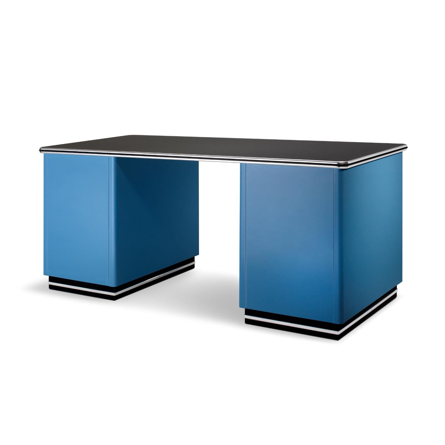 Executive metal desk in classical industrial design style. The timeless essential form with two cests of drawers, creates a clear and distinctive worksplace, adapted for different interior situations. The desktop can be covered on choice with