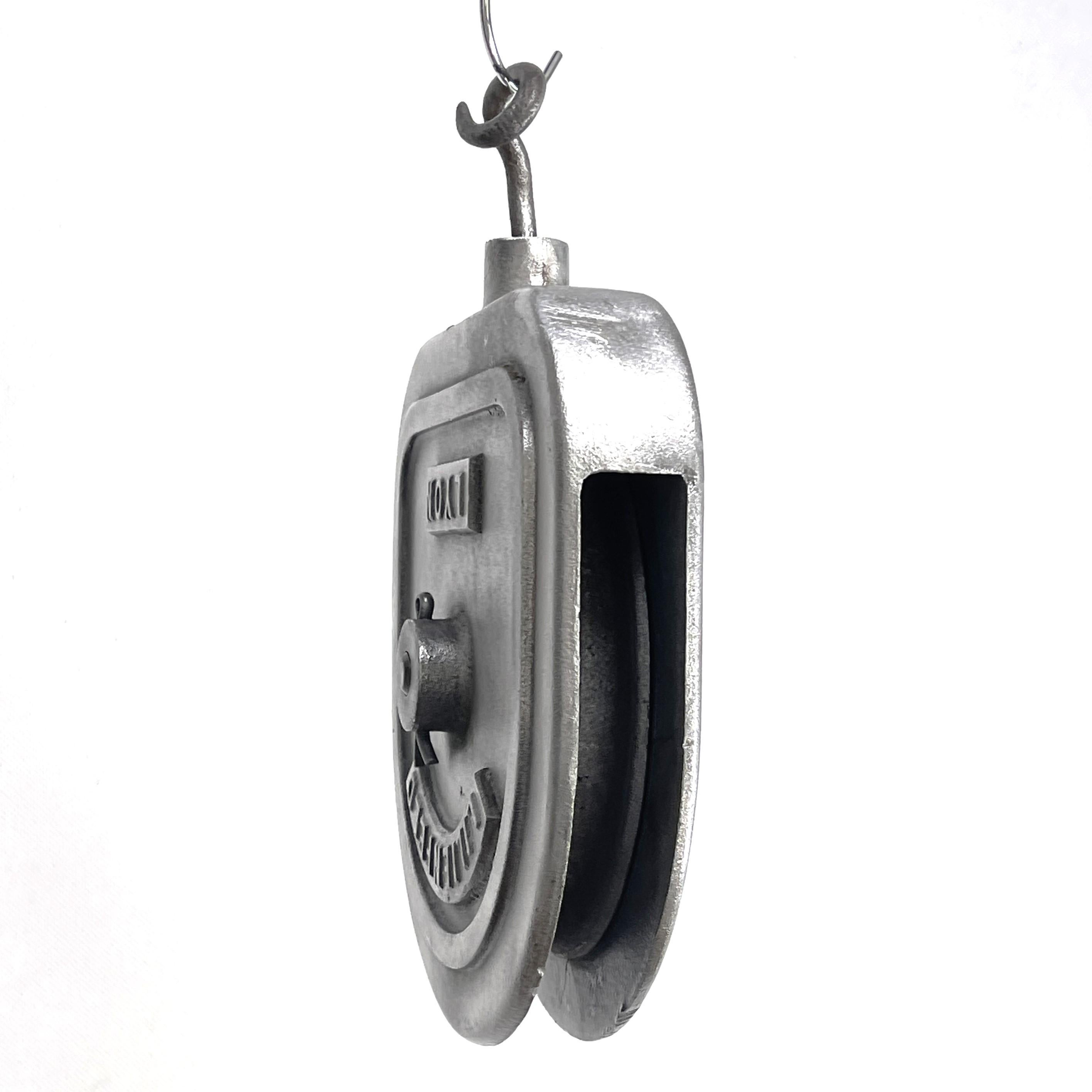 Old large Pulley Industrial Design - 1950/60s

The old pulley (cable pull) in industrial design is an impressive piece of the past times. It combines the charm and sturdiness of the past industrial era. 

This iron pulley was once used by farmers