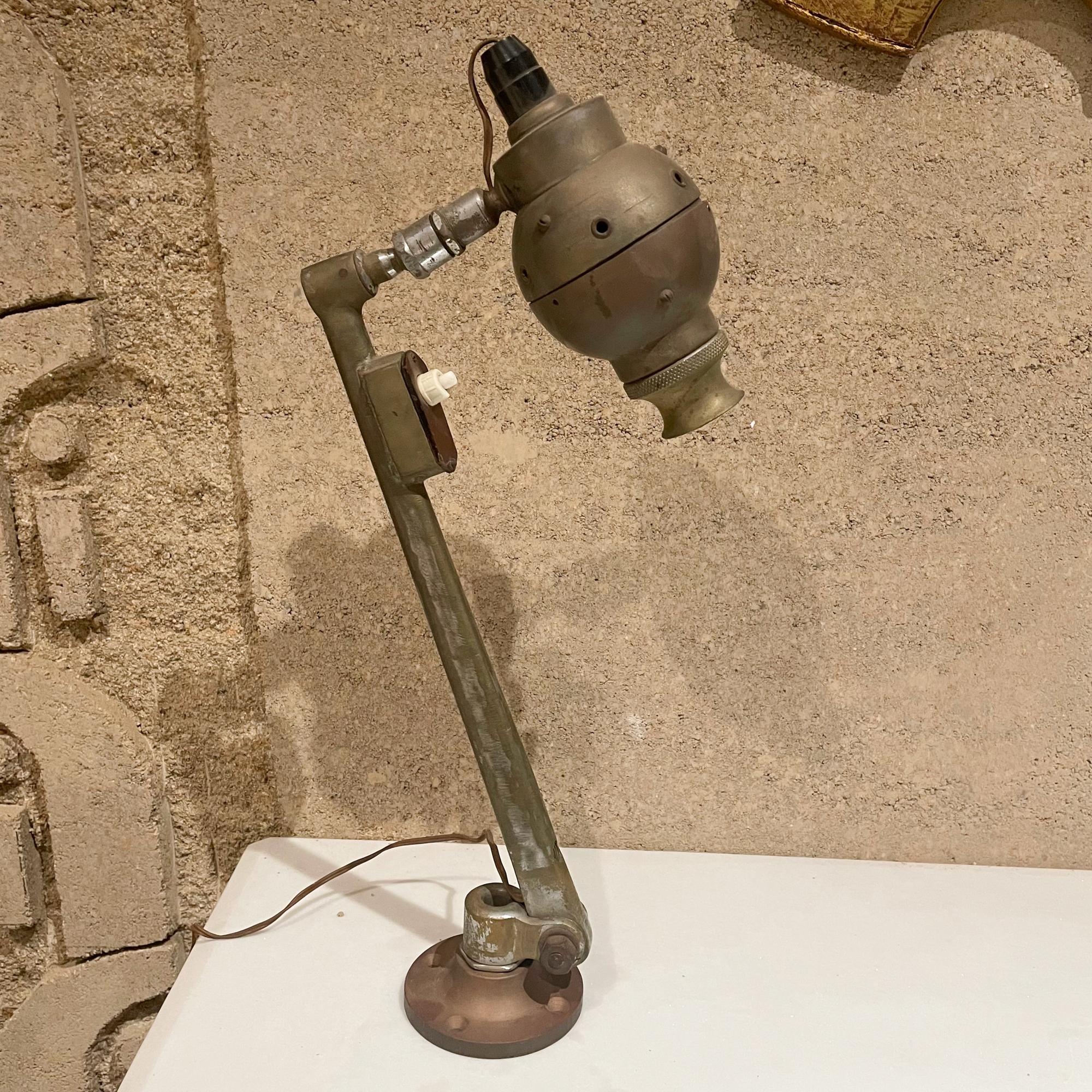 Lamp
Similar to style of Oscar Torlasco Milan Italy for Lumi model 533- an industrial table desk lamp in patinated brass
Unidentified. Unmarked. No design verification is present. Lamp acquired in Italy.
Measures: 15H x 6D x 3.25 W