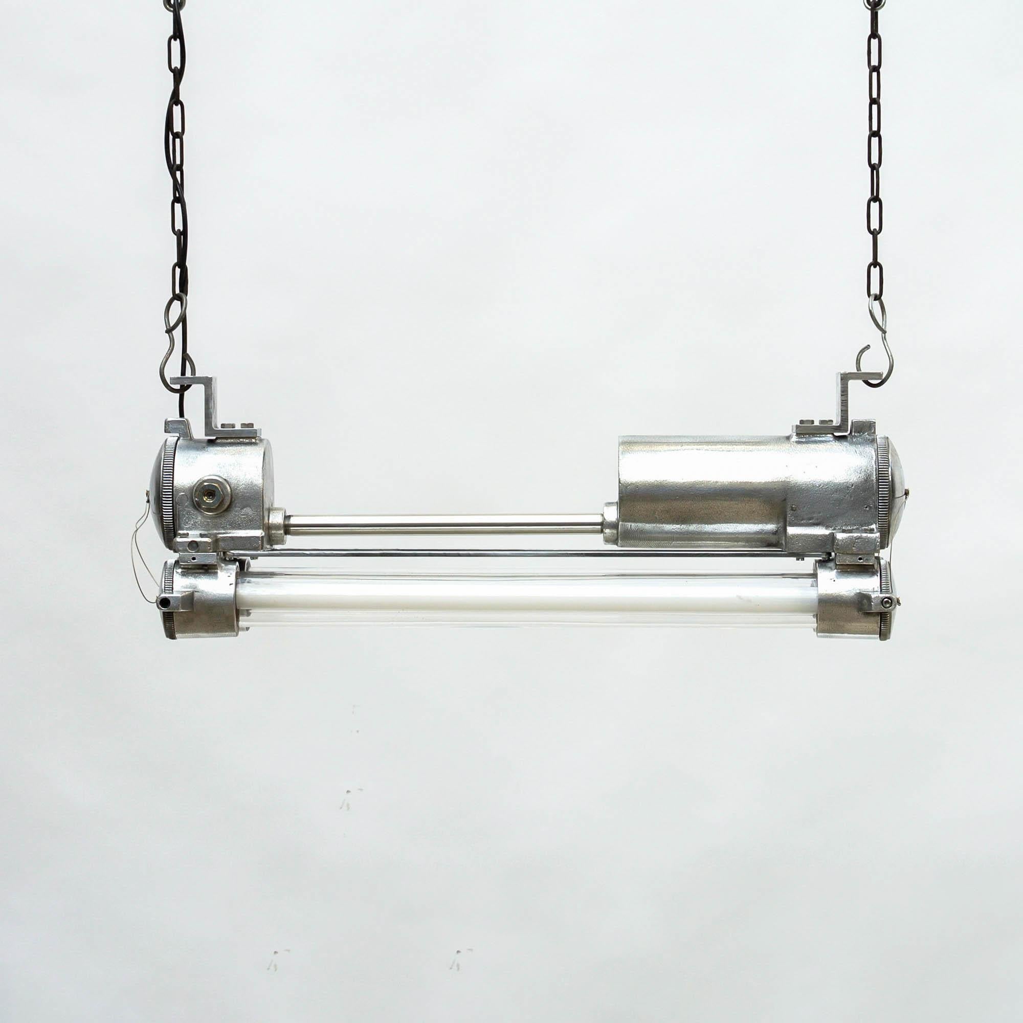 Cast aluminium fluorescent explosion-proof ceiling light, originally used in hazardous area. Fully restored: stripped, brushed polished and rewired with new electronic ballast (lighter) and fluorescent tubes commercially available (T8 2700K type,