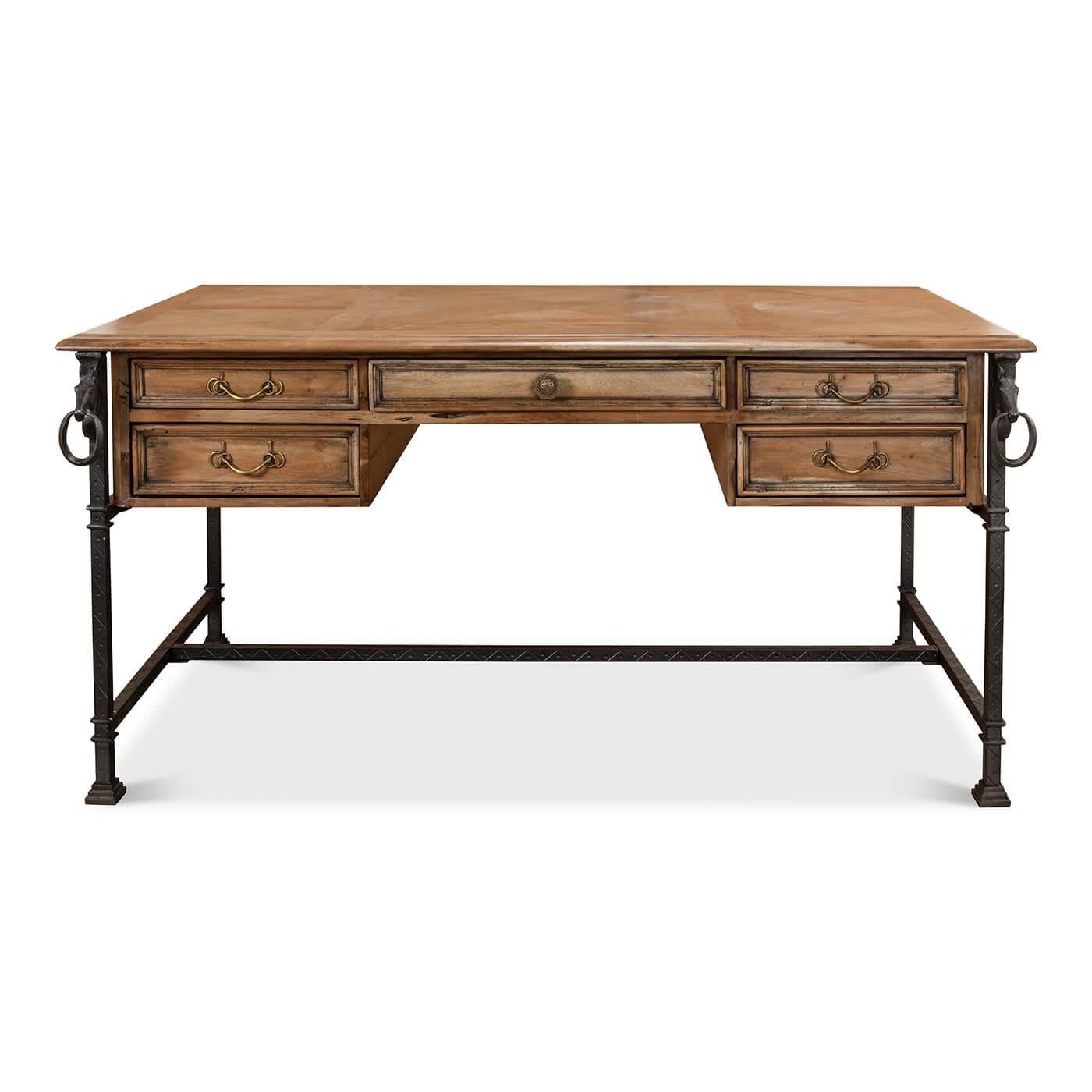 The Industrial Equestrian desk of walnut and reclaimed wood with an iron base. The parquetry inlaid top with five drawers is flanked by two horse heads and raised on a textured iron H-stretcher base.

Dimensions: 62