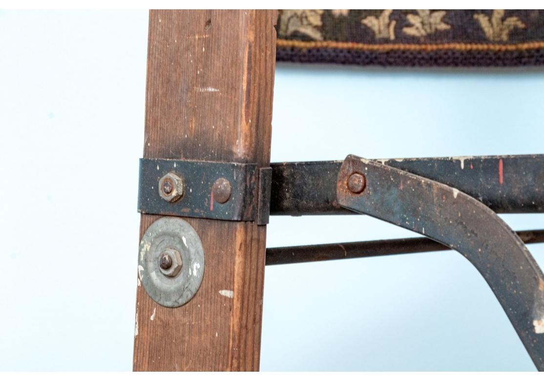 Large Industrial Age Ladder in Pine with metal curved handrails and folding mechanism. Sturdy and useful for the Library, Art Studio or as a Display piece. With the original castors. 

Dimensions: 44.5” wide (When open) 17.5” deep by 78.5”.