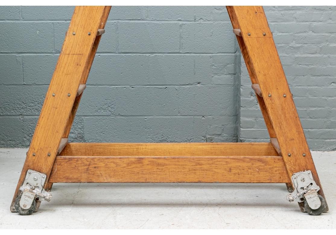 20th Century Industrial Era Wood Ladder with Tall Iron Pipe Handles For Sale